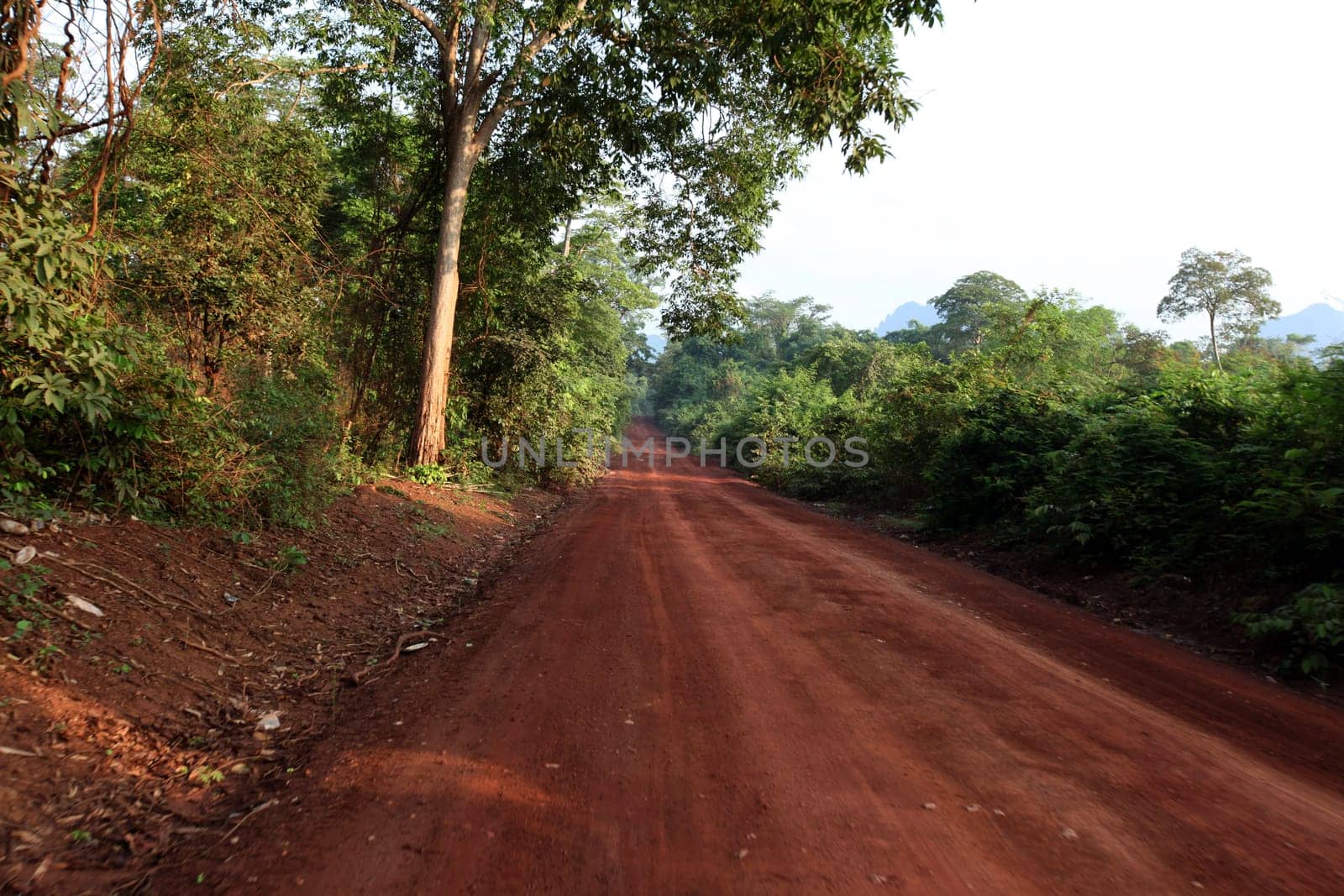 The hilly landscape on highway 12 between the city of Tha Khaek and the village of Mahaxai Mai in central Laos on the border with Thailand in South East Asia.