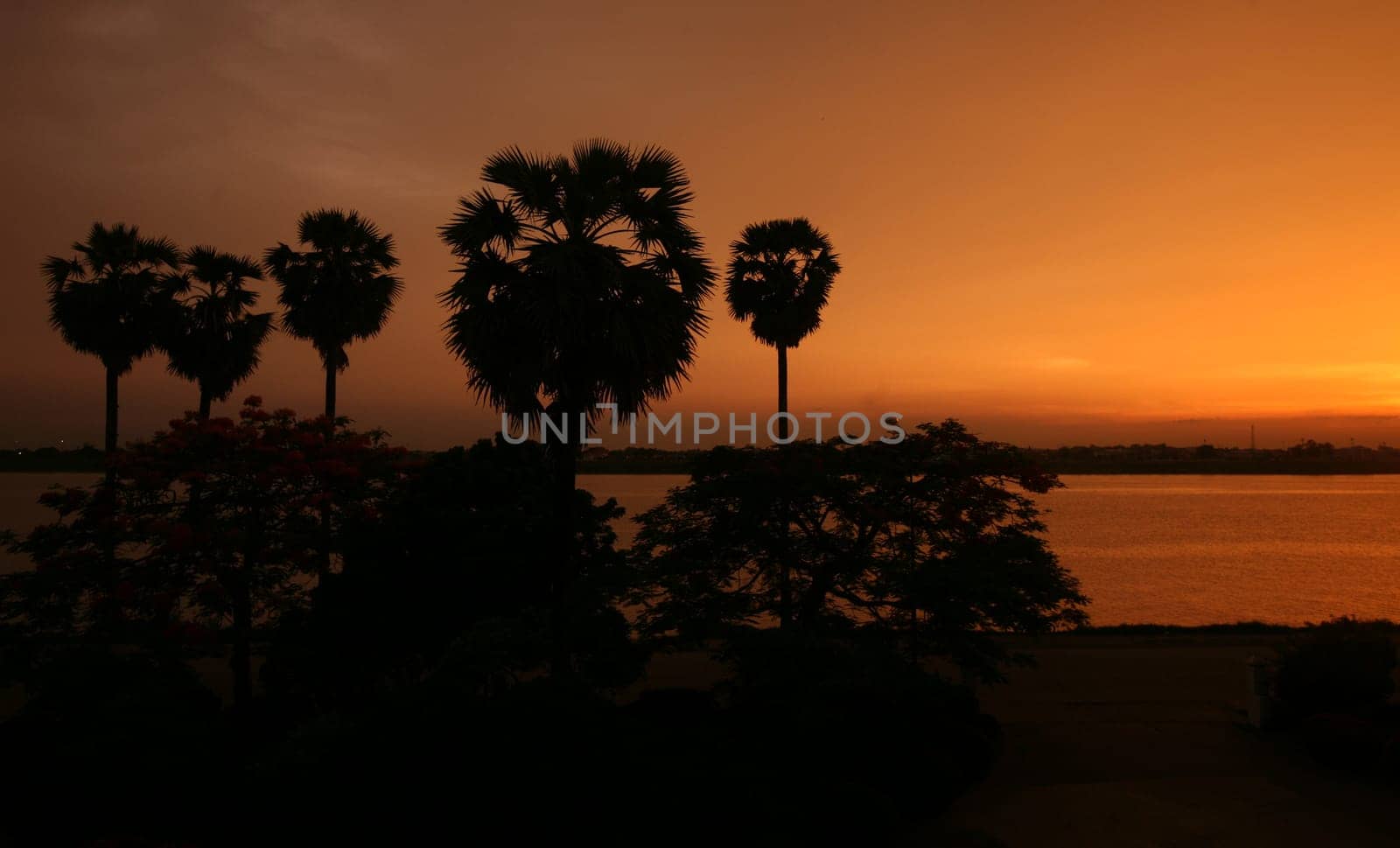 The landscape of the border river Mekong River in the town of Tha Khaek in central Laos on the border with Thailand in South East Asia.