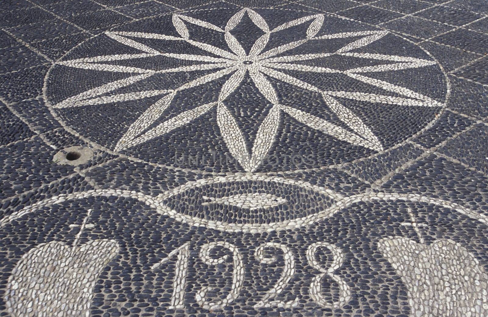 The stone floor in front of the church Igreja Nossa Sennhora da Piedade of the village of Porto Santo on the Portuguese island of Porto Santo near Madeira in the Atlantic Ocean