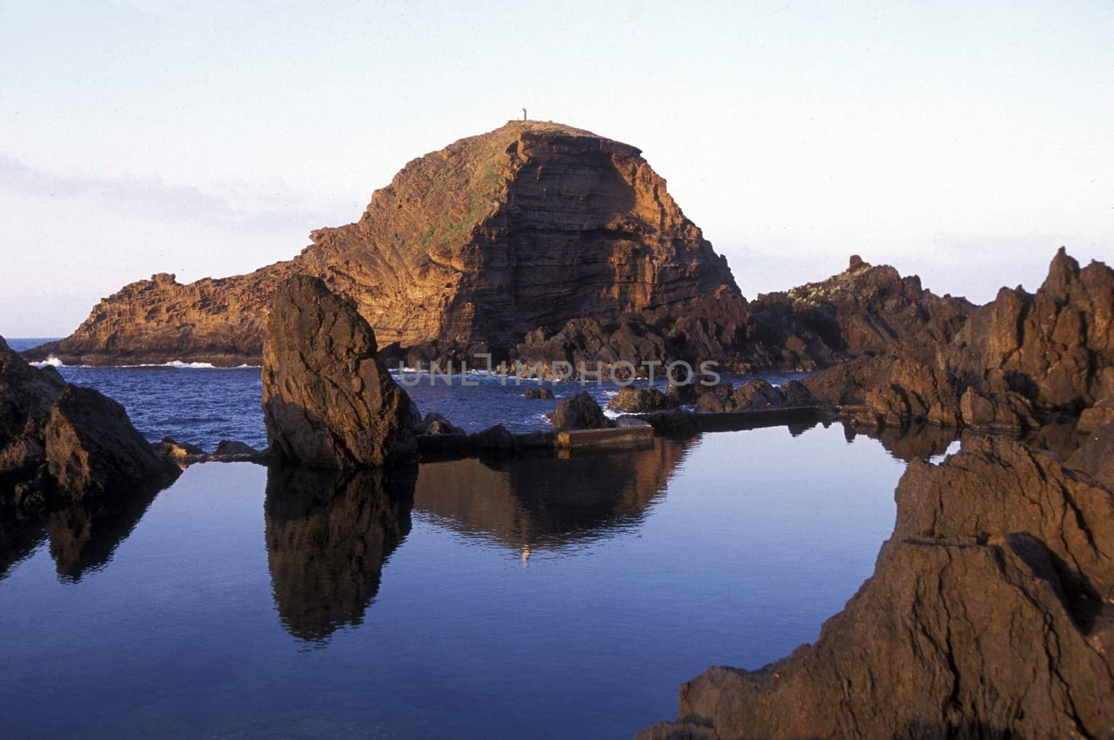 Europe,Atlantic Ocean,Portugal,Island,Madeira,Porto Moniz,Sea,Landscape,Pool,Pool,Coast,. A sunset on the coast near the village of Porto Moniz in the north island of Madeira in the Atlantic Ocean,Portugal,(Urs Flueeler)