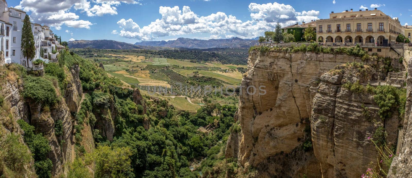 Ronda panoramic view. A city in the Spanish province of Málaga, within the autonomous community of Andalusia. Is situated in a very mountainous area about 750 m above mean sea level. The Guadalevín River runs through the city, dividing it in two and carving out the steep, 100 plus meters deep El Tajo canyon upon which the city perches