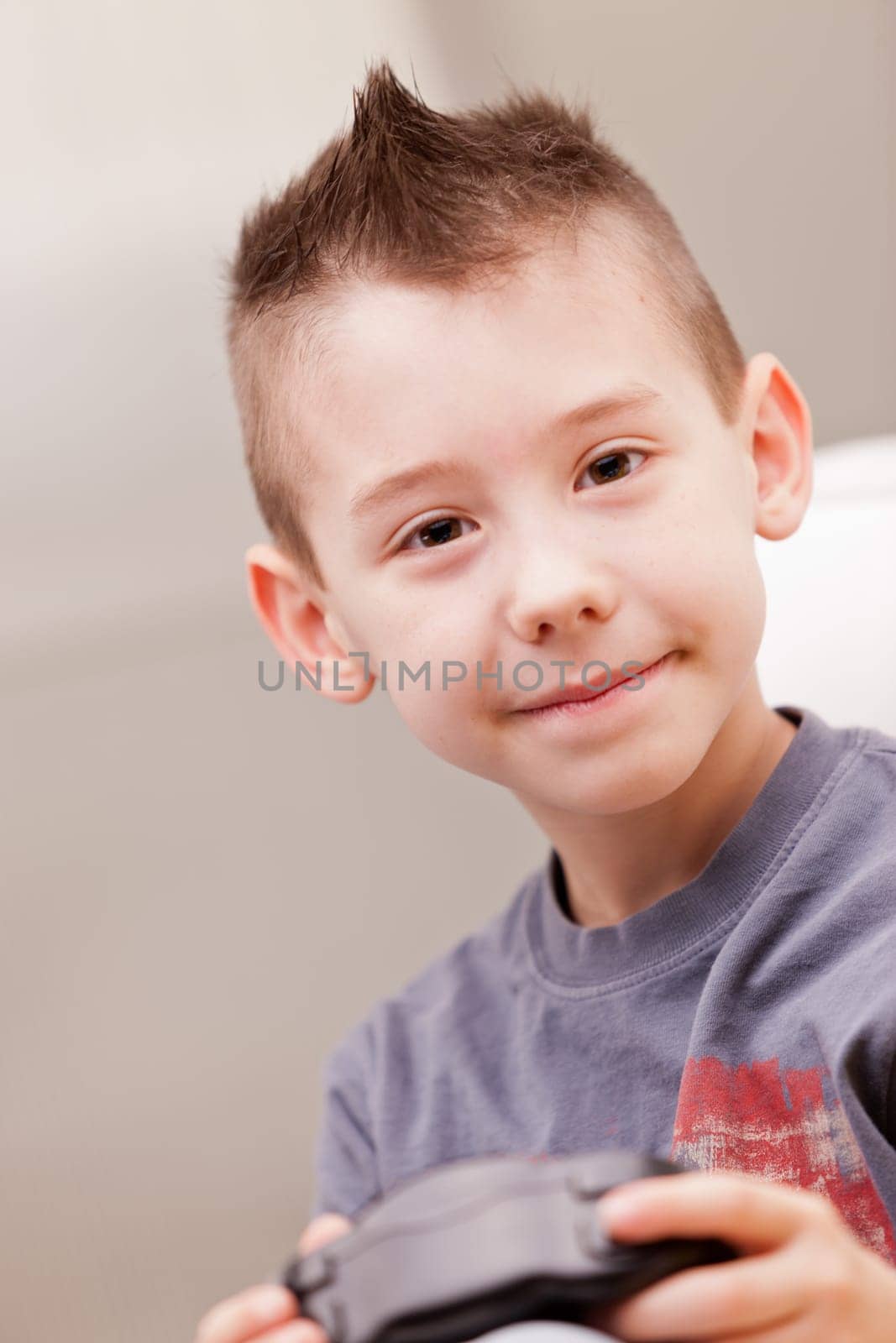 Kid having fun with video games in a brighly lit living room
