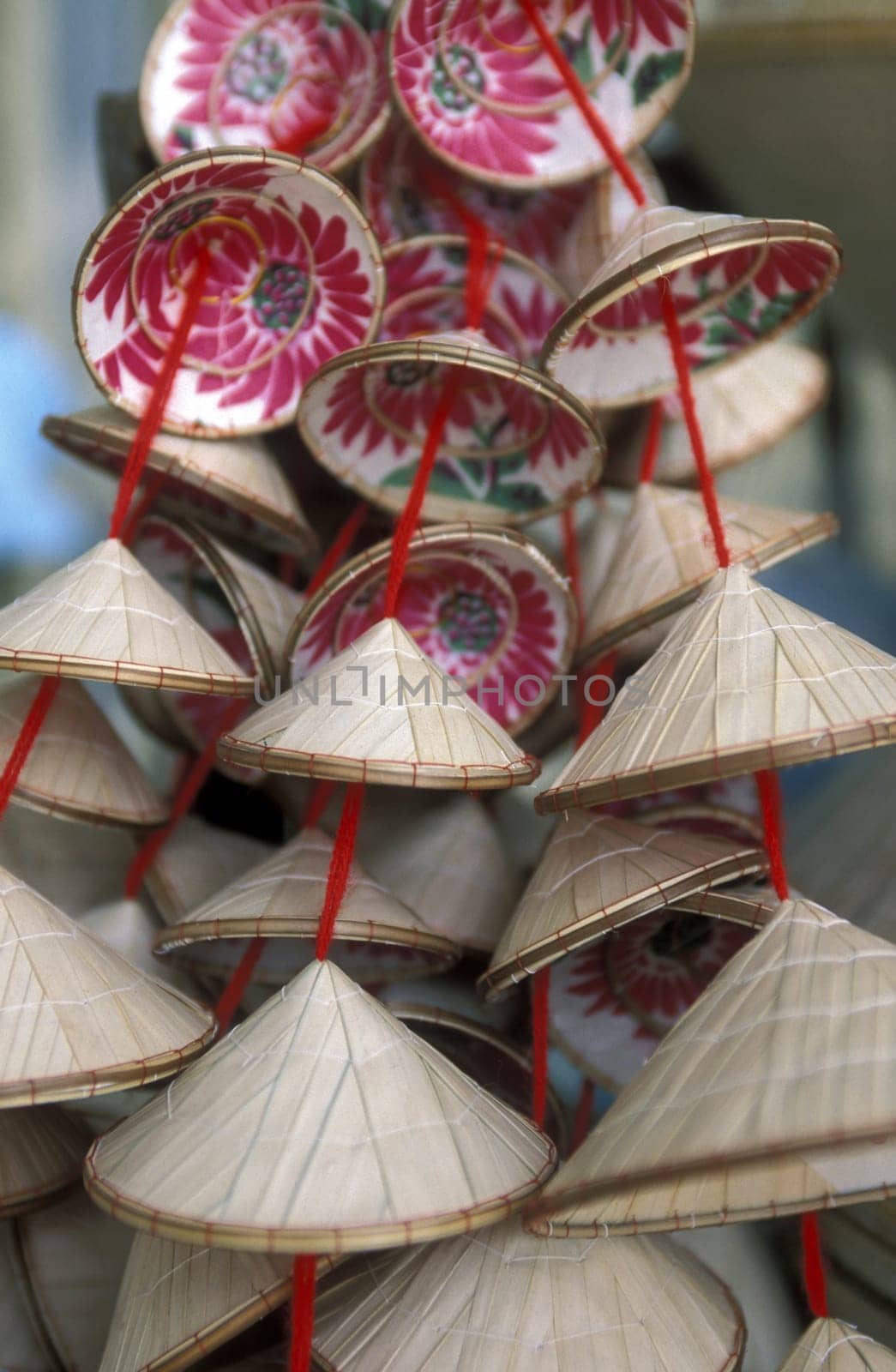 Small Vietnamese straw huete at the market in the district of Cholon in Saigon in the south of Vietnam in South East Asia.