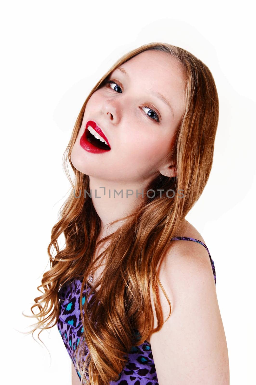 A closeup picture of a lovely teenager with blue eye's and long brunette.hair, isolated for white background..