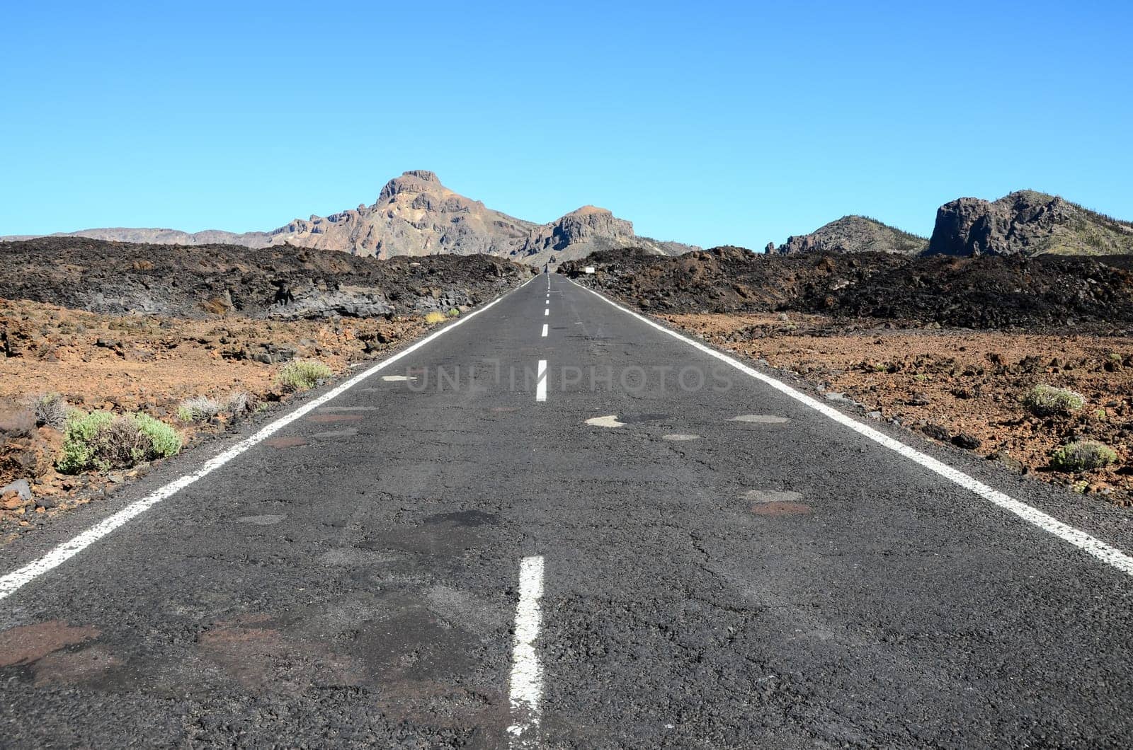 Long Empty Desert Asphalt Road in Canary Islands Spain
