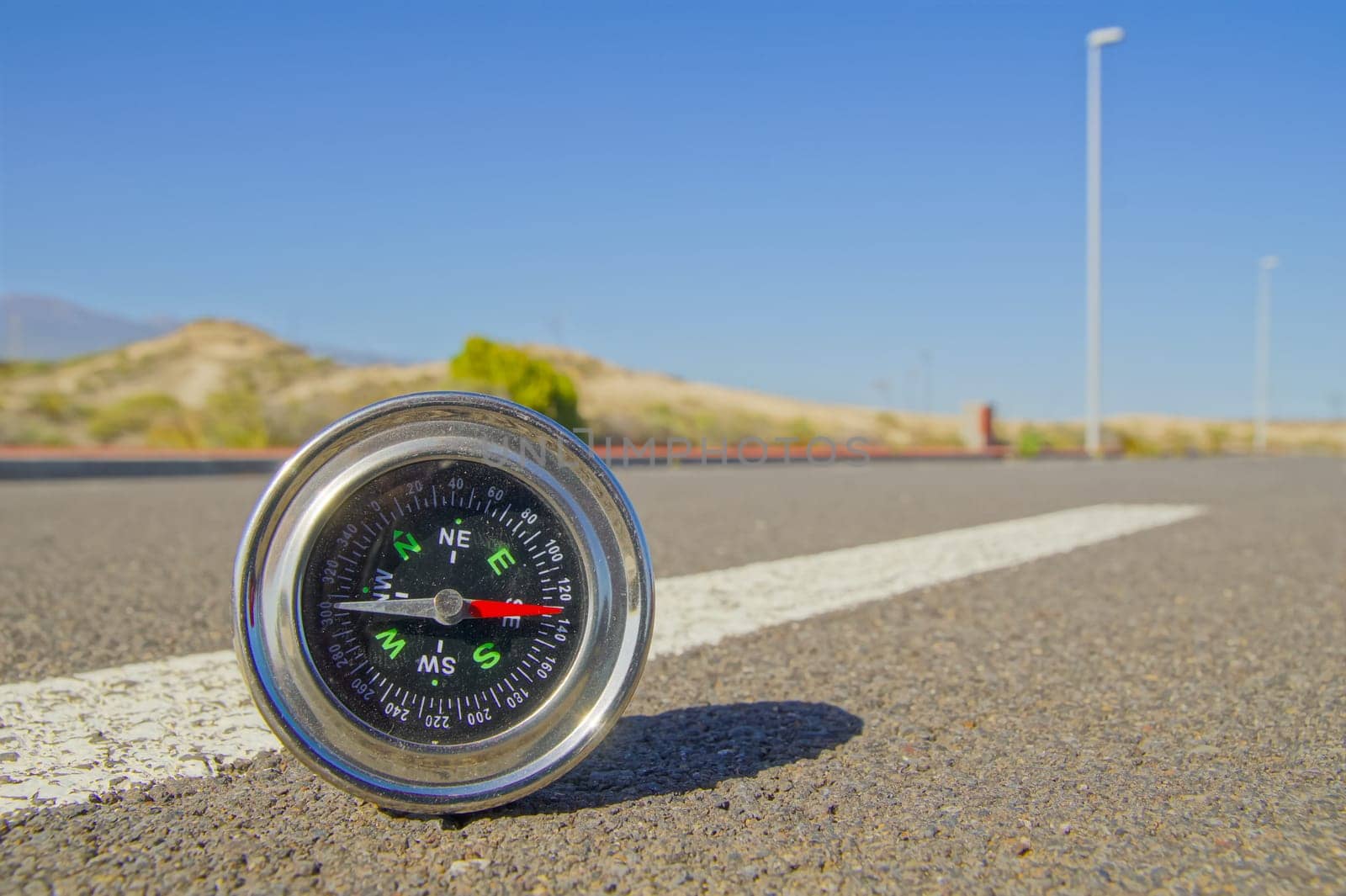 Travel Concept Compass on the Asphlat Road