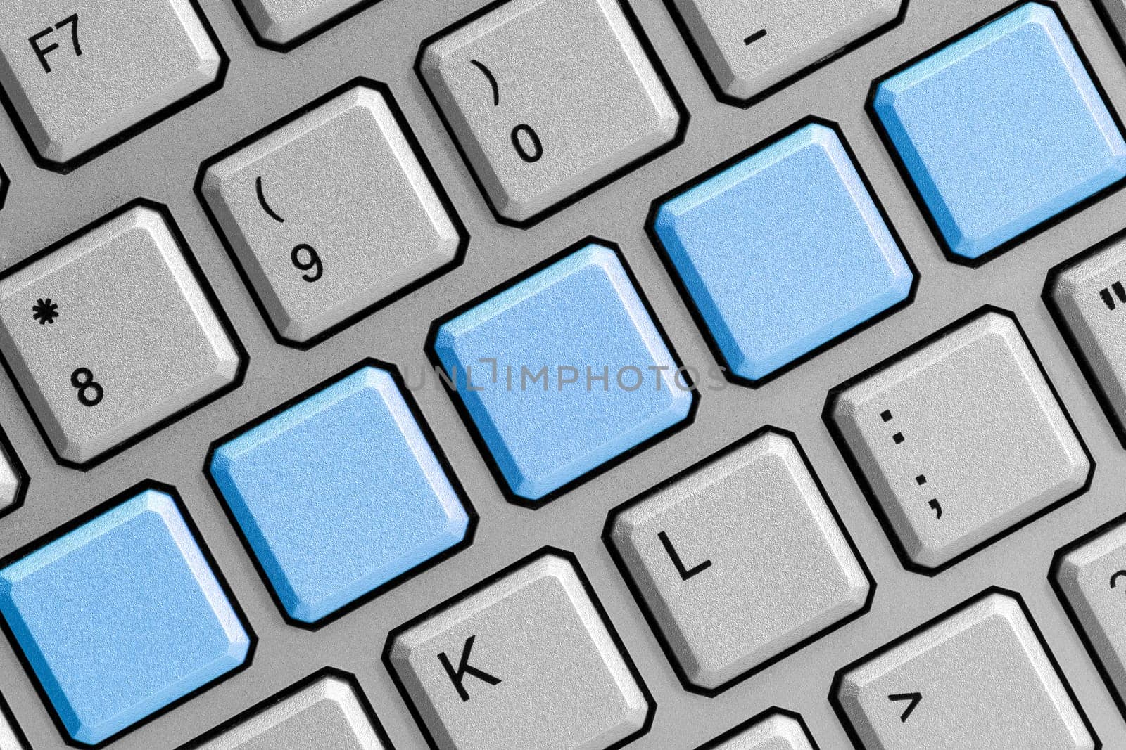 Blank blue buttons on the keyboard close-up