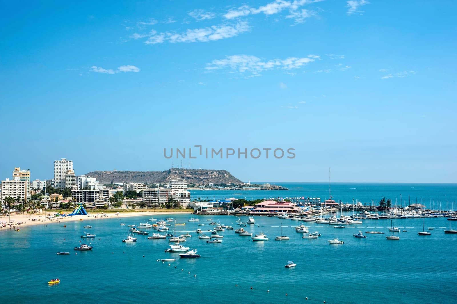 Salinas beach with apartment buildings and yacht club in Ecuador, Pacific Coast