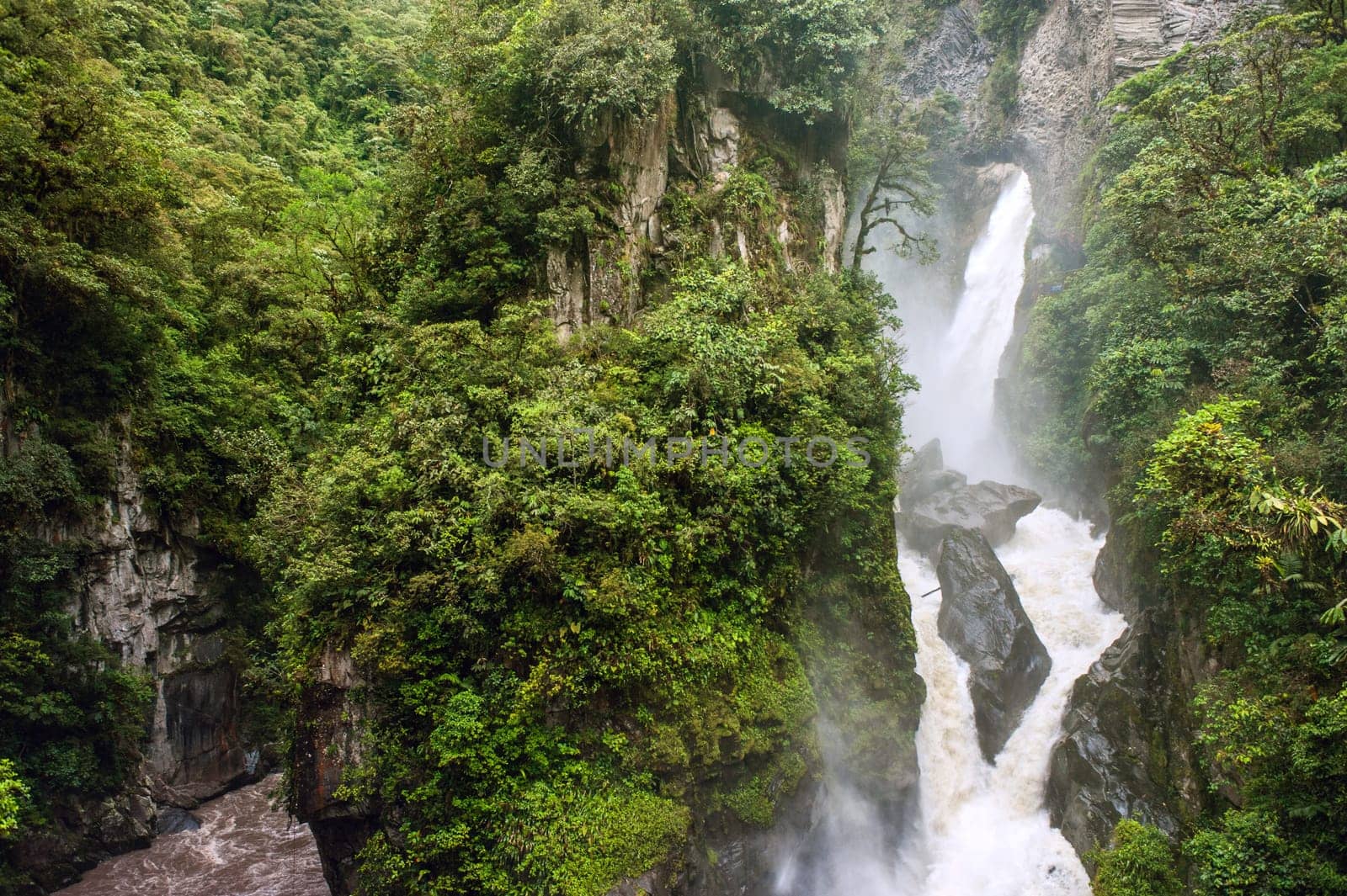 Pailon del Diablo - Mountain river and waterfall in the Andes. Banos. Ecuador