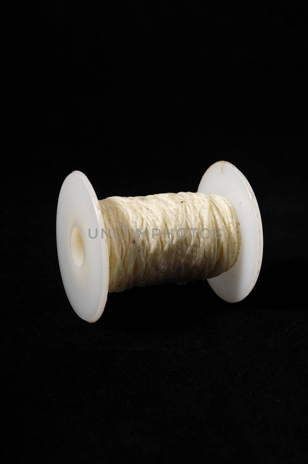 Roll of Twine isolated on a Black Background
