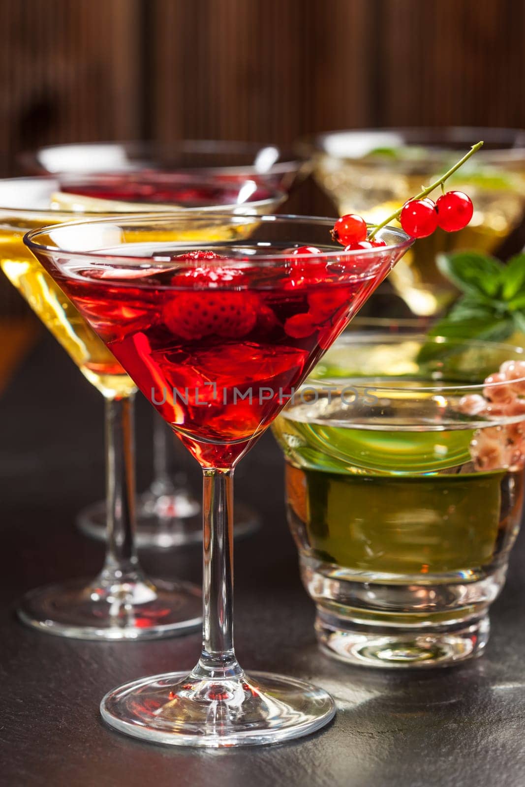 Party cocktails and longdrinks garnished with fruits for summer