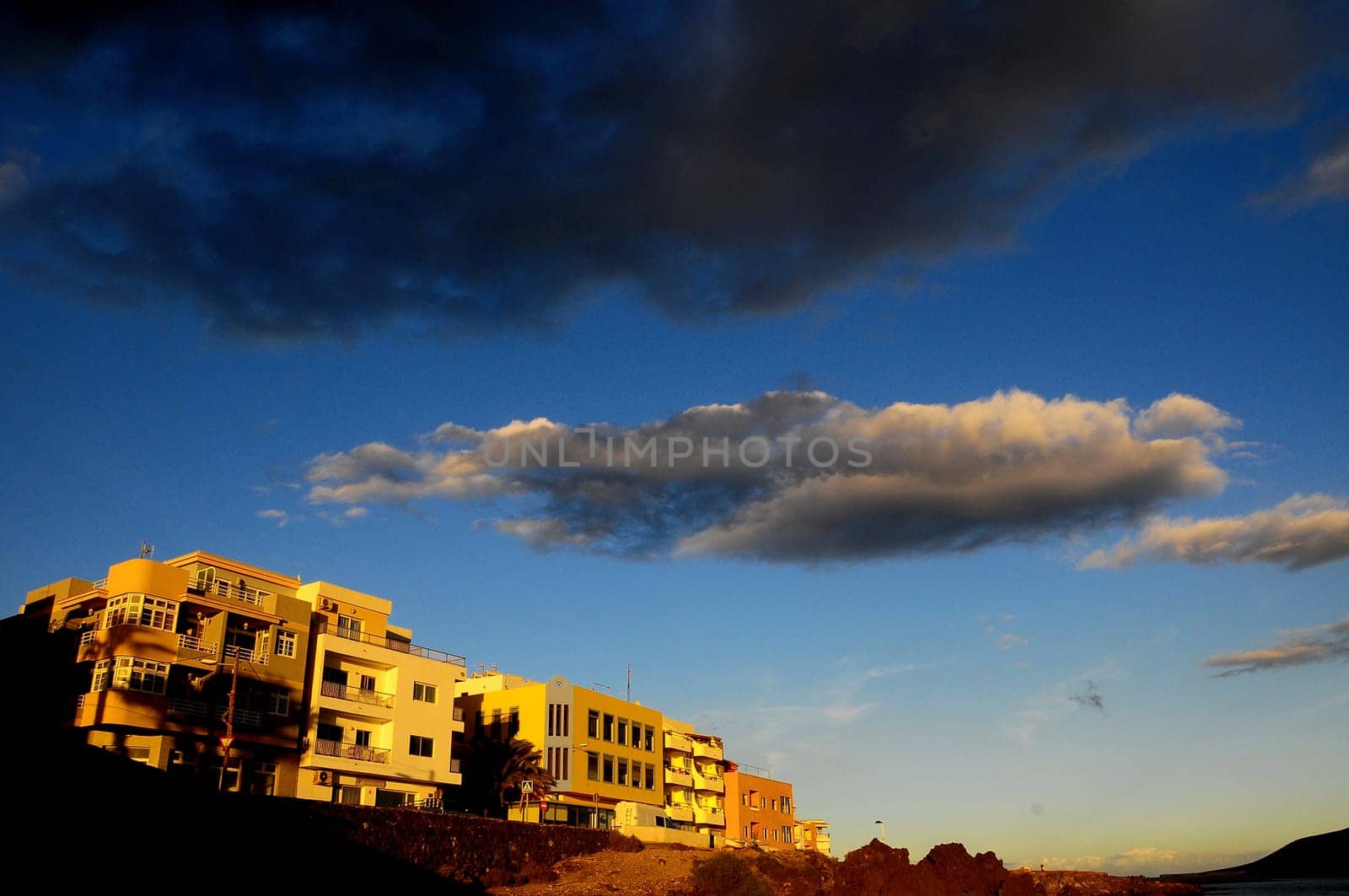 Cloudscape, Colored Clouds at Sunset near the Ocean