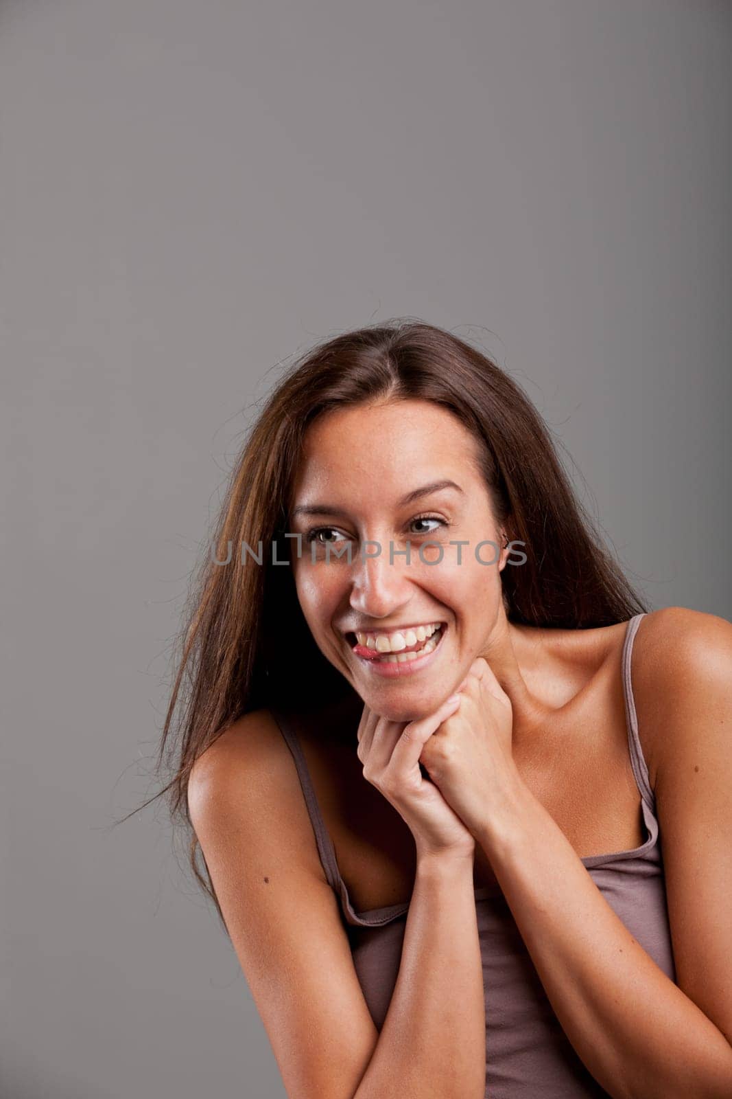 a smiling girl delighted about something gorgeous or a delicacy