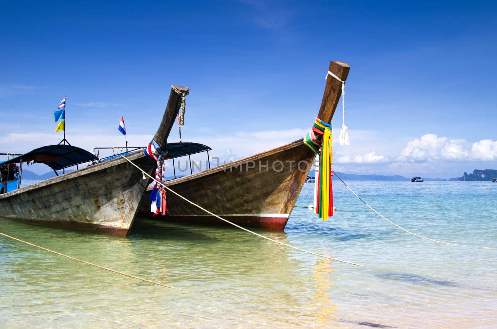 Tropical beach, longtail boats, Andaman Sea, Thailand