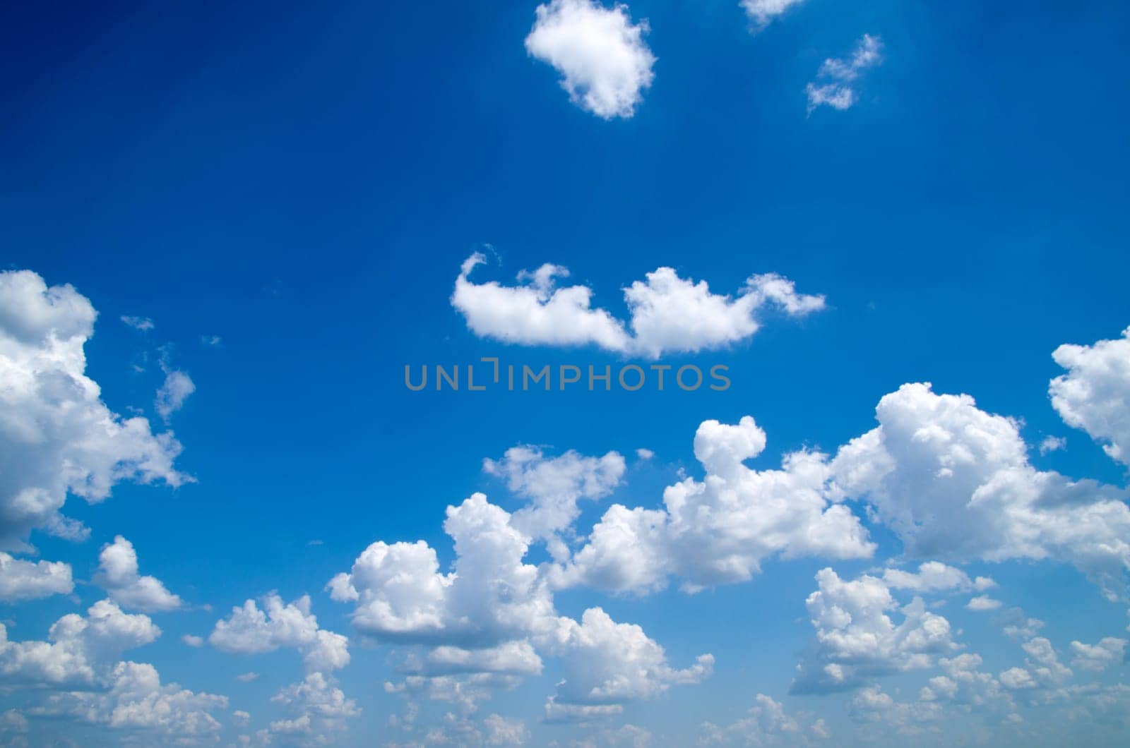 blue sky is covered by white clouds