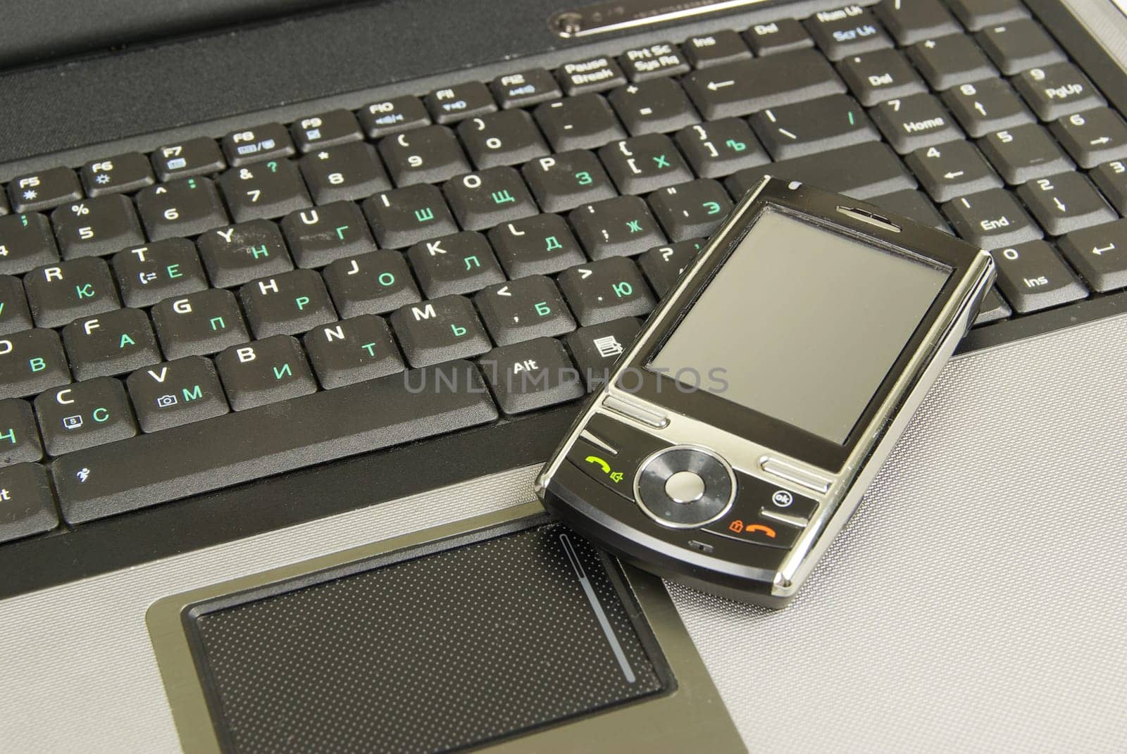 mobile isolated on a laptop