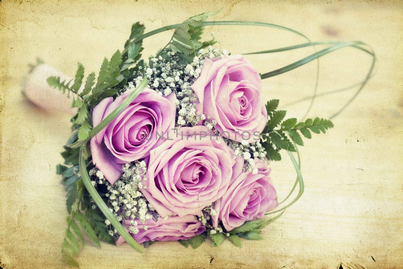 Vintage photo of wedding bouquet of pink roses