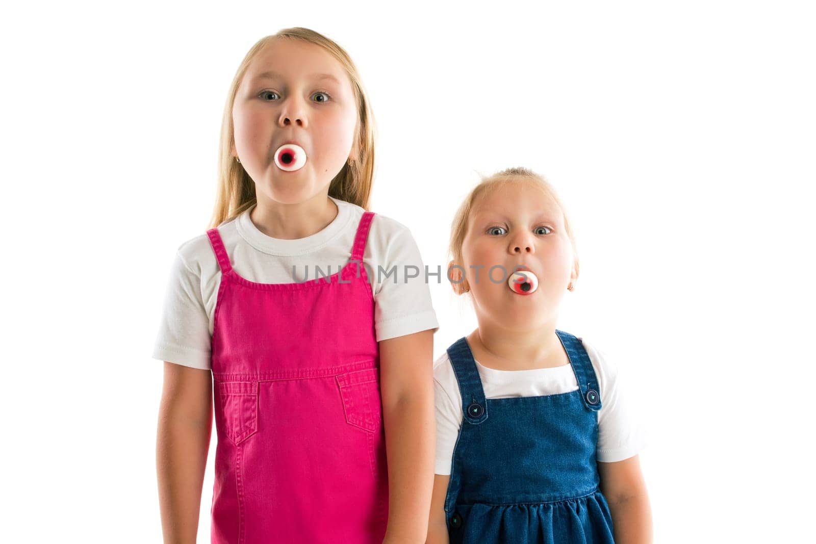 girls with eyes in their mouths. studio shot