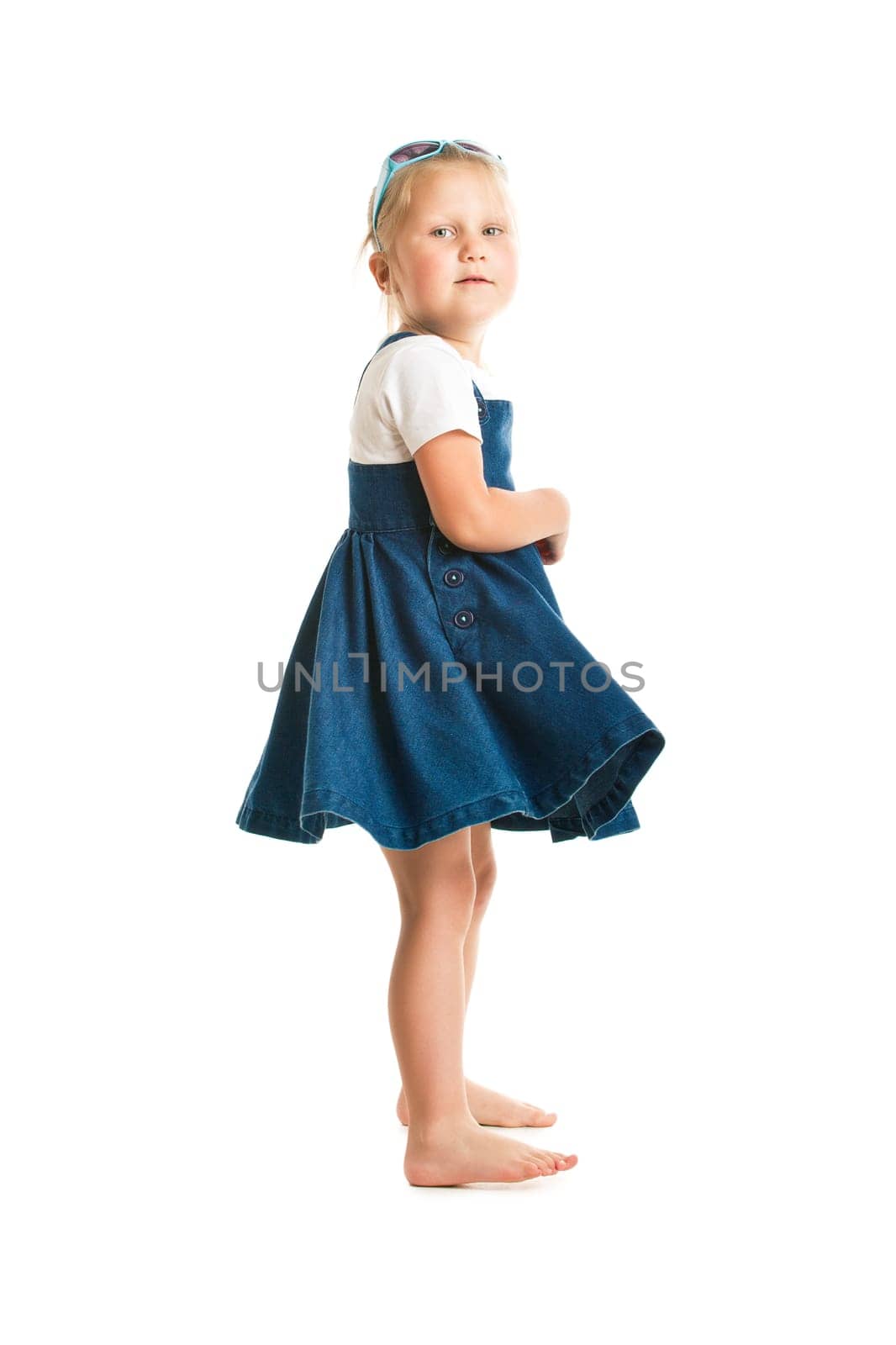 dancing little girl. studio shot