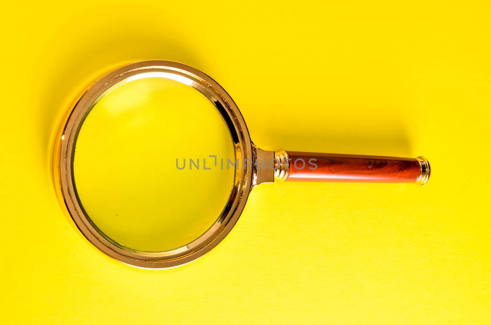Vintage Magnify Glass Loupe on a Colored Background
