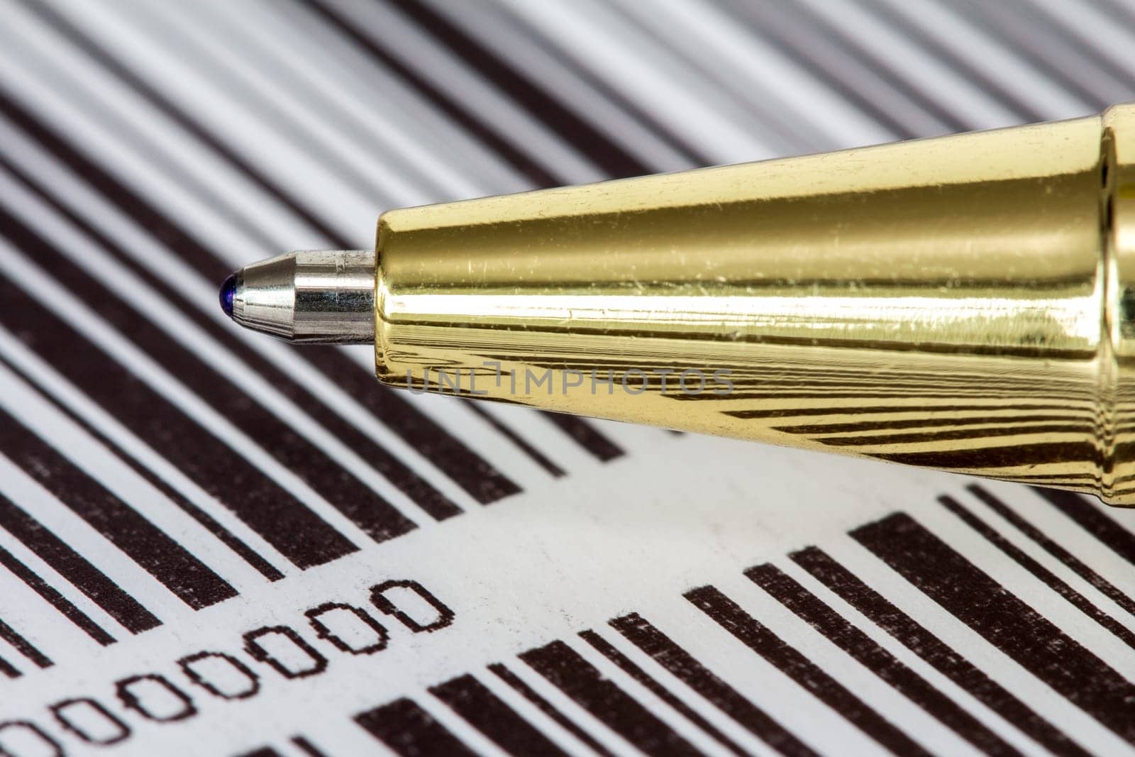 Close up view of pen on barcode background