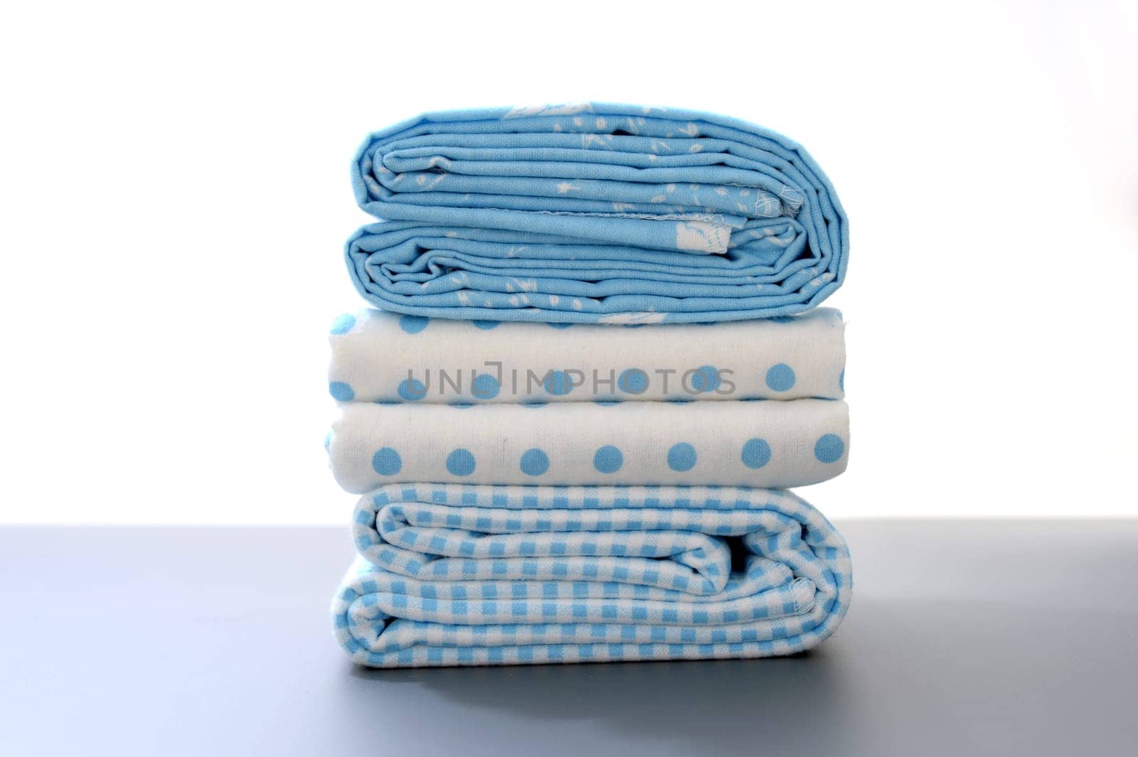 A close up shot of baby bed sheets