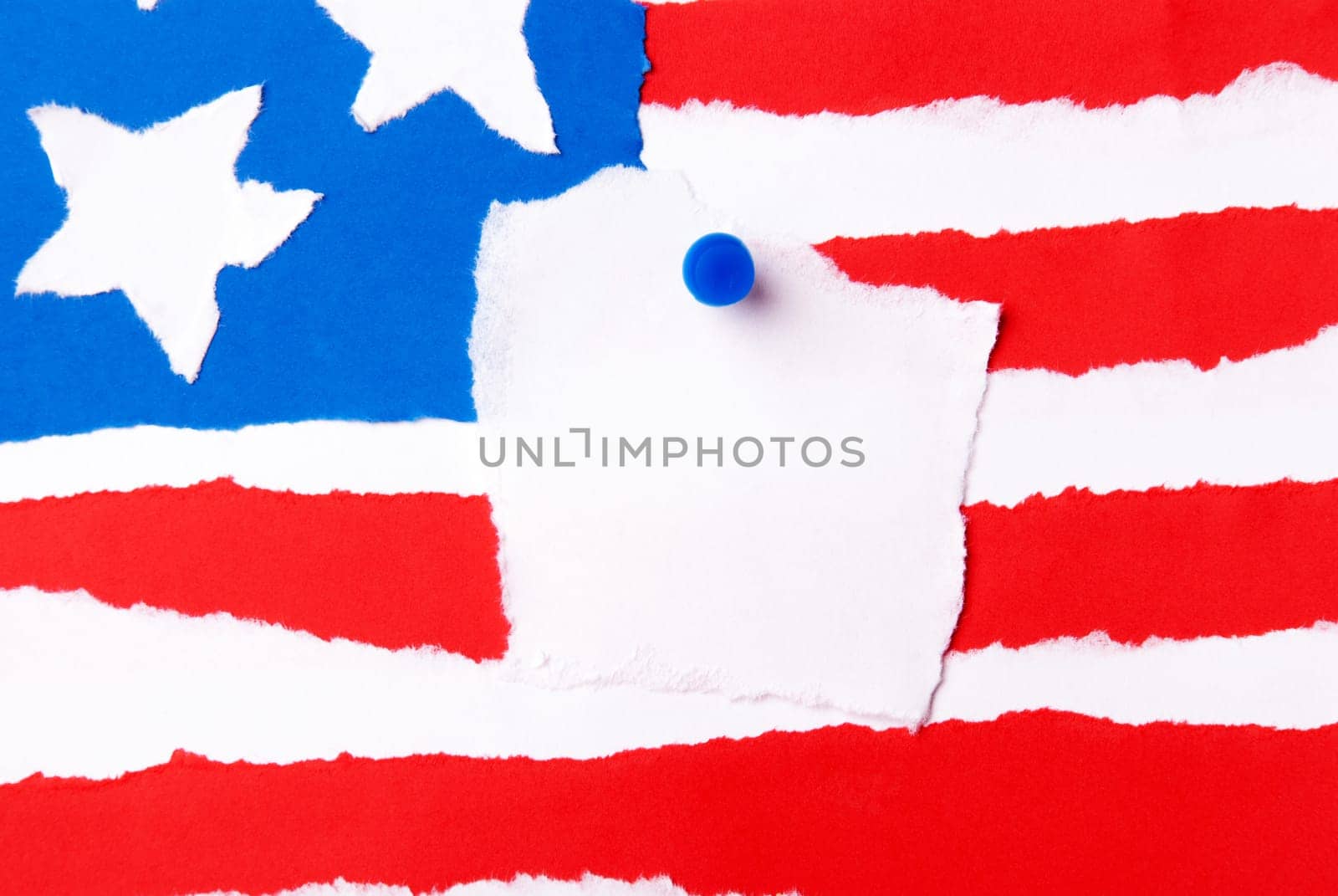 An American Flag out of Paper with a Notice Paper in the Middle with Copy Space