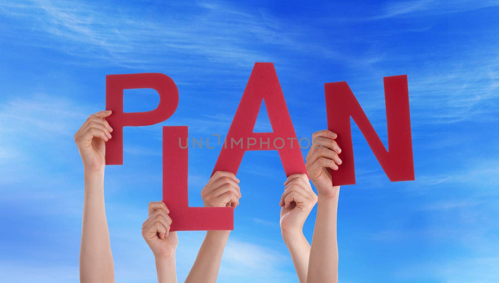 hands holding four pieces of a puzzle with copy space, gray background
