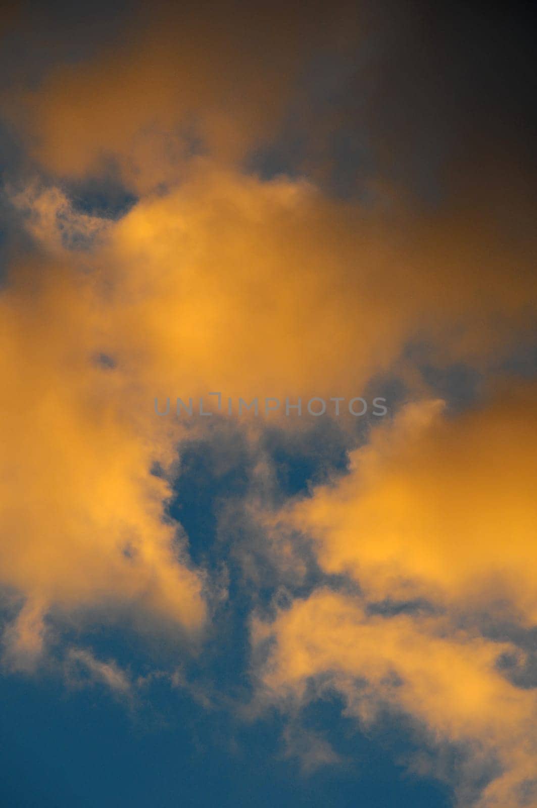 Cloudscape, Colored Clouds at Sunset near the Ocean