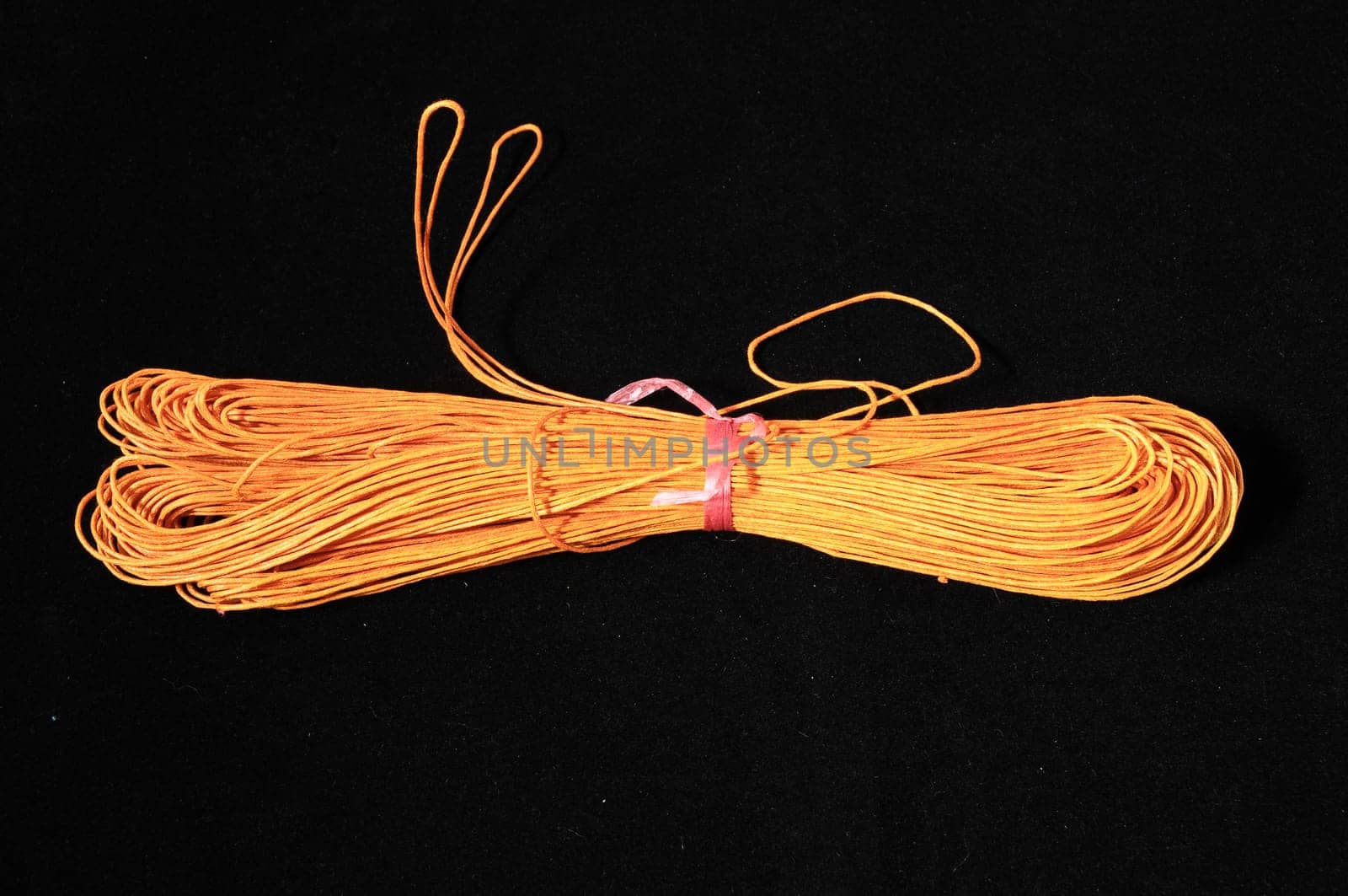 Roll of Twine isolated on a Black Background