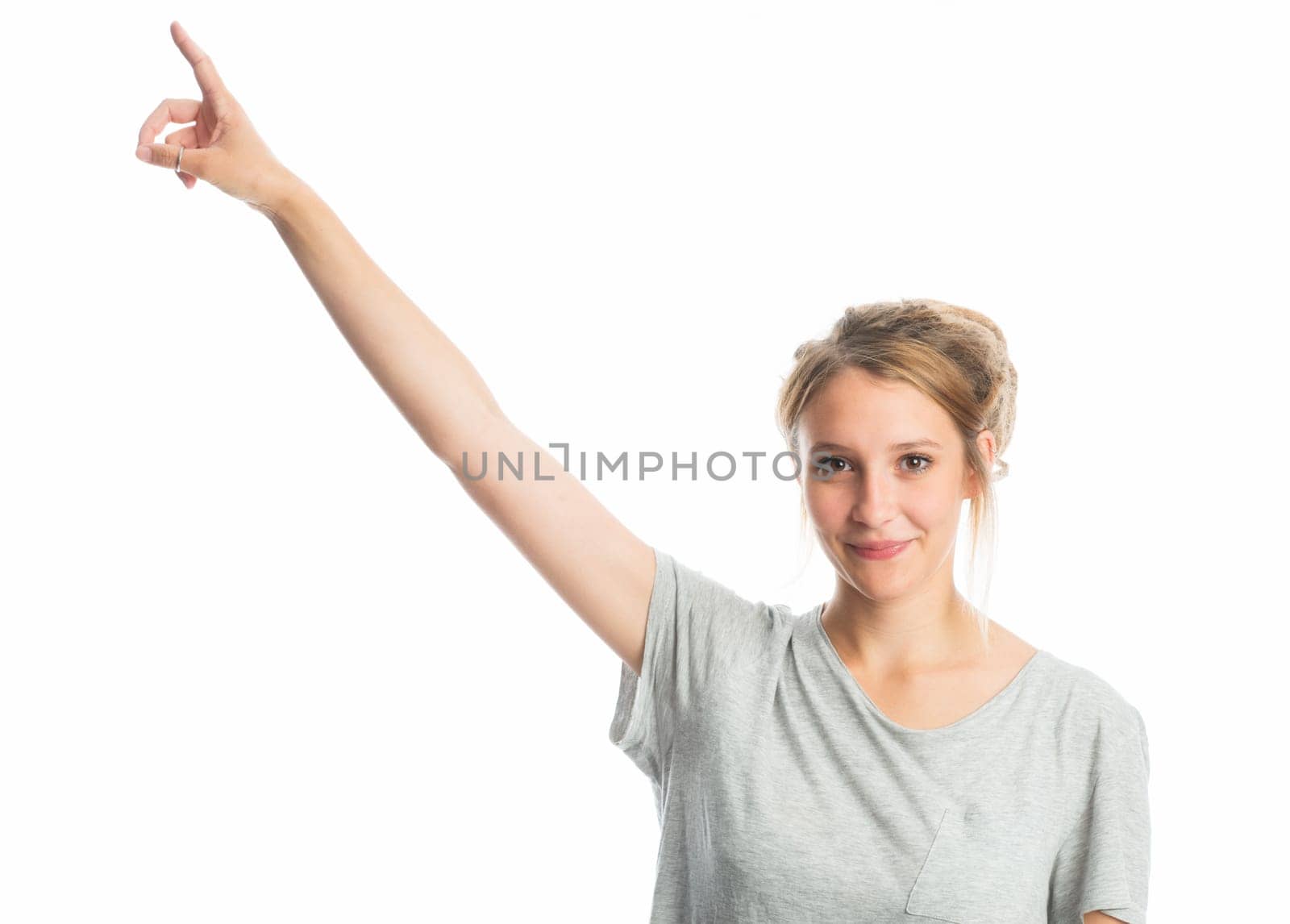 Blonde girl points her finger up