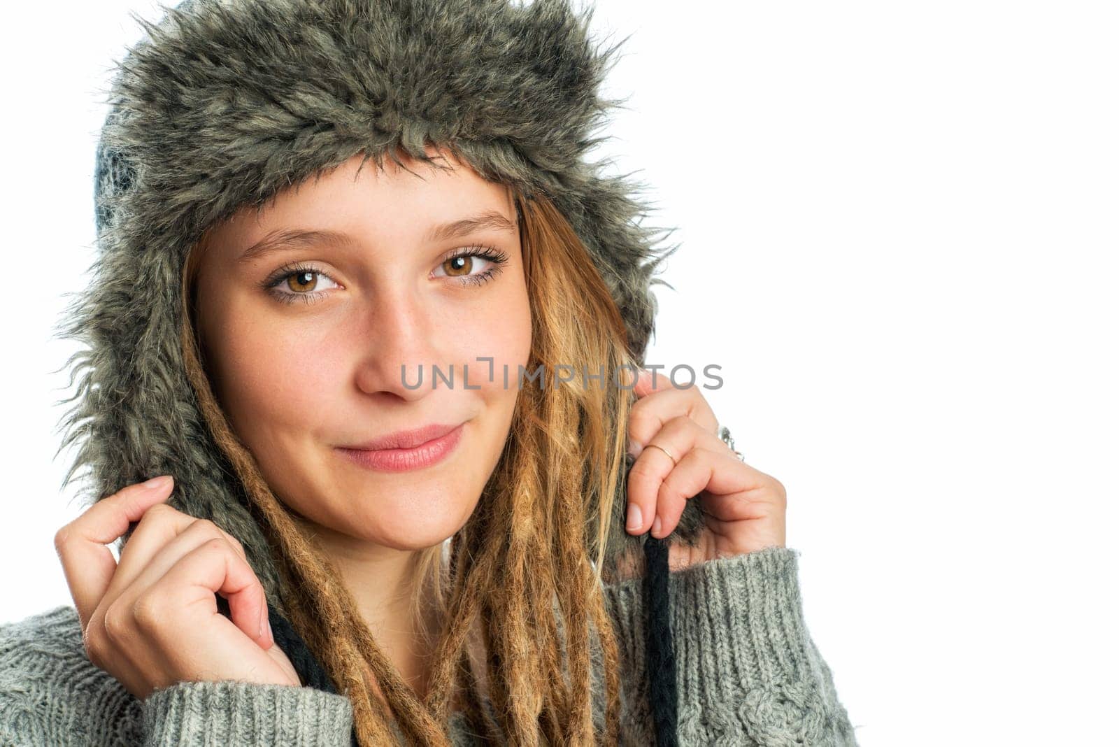 Girl with dreadlocks and fur hat