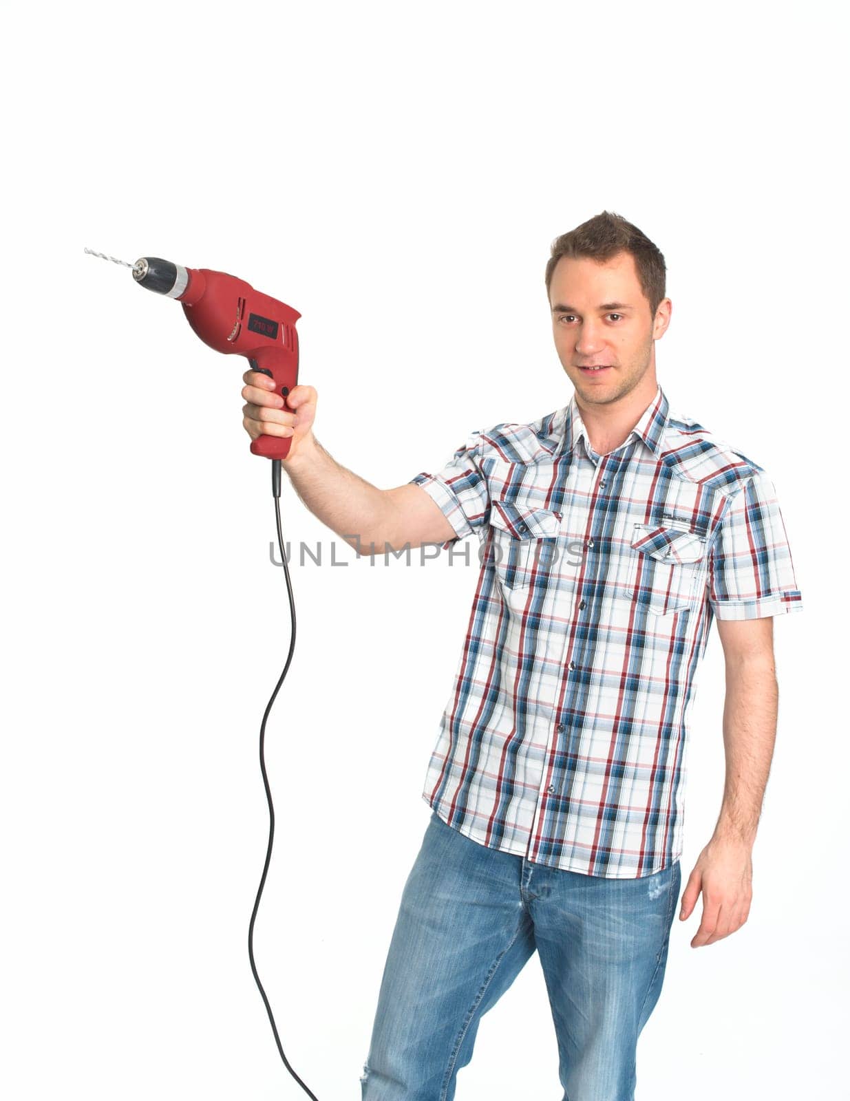 Young man with drill