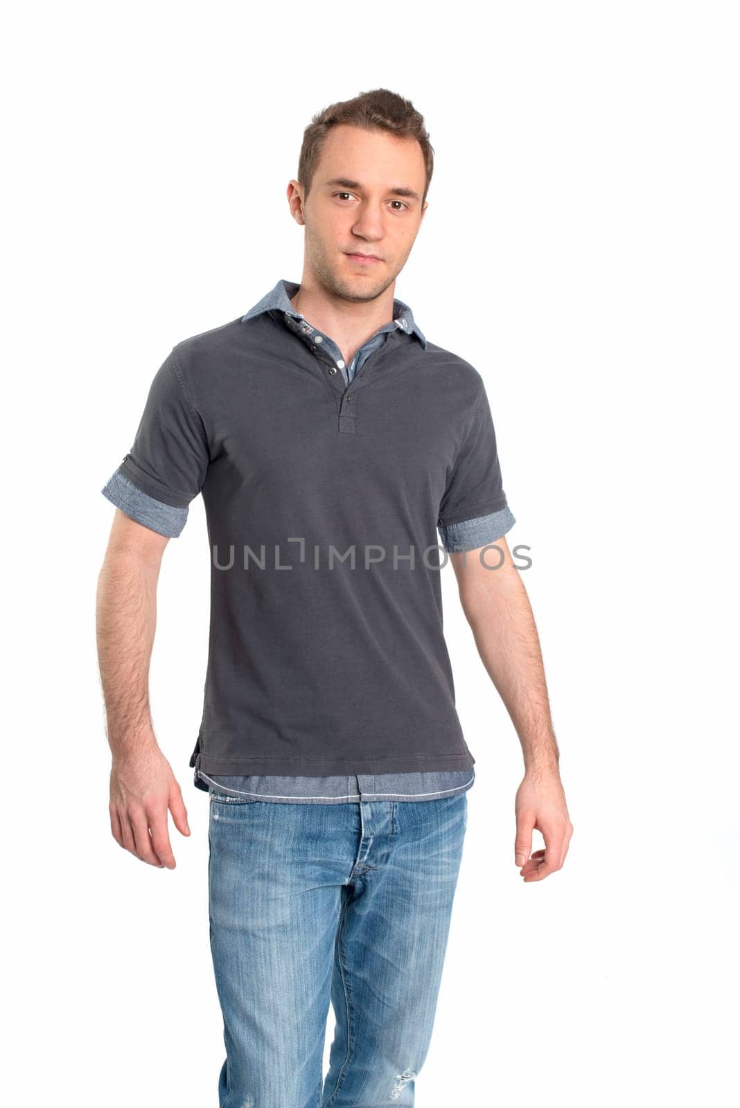 Pretty young man in jeans