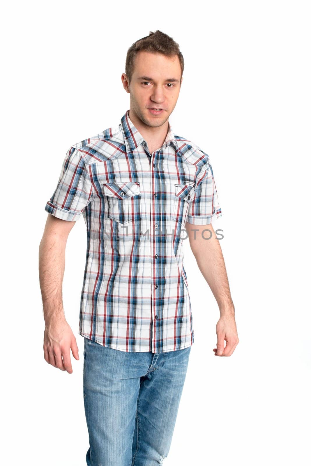 Pretty young man in jeans