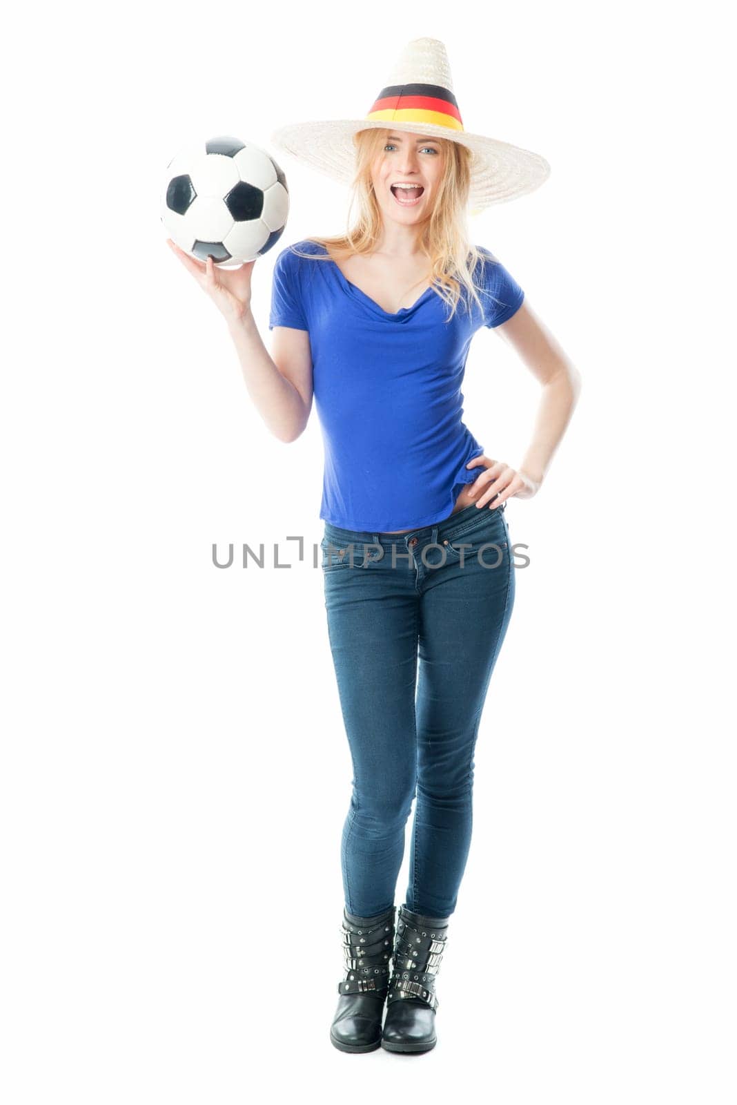 Blonde football fan with fan hat and football
