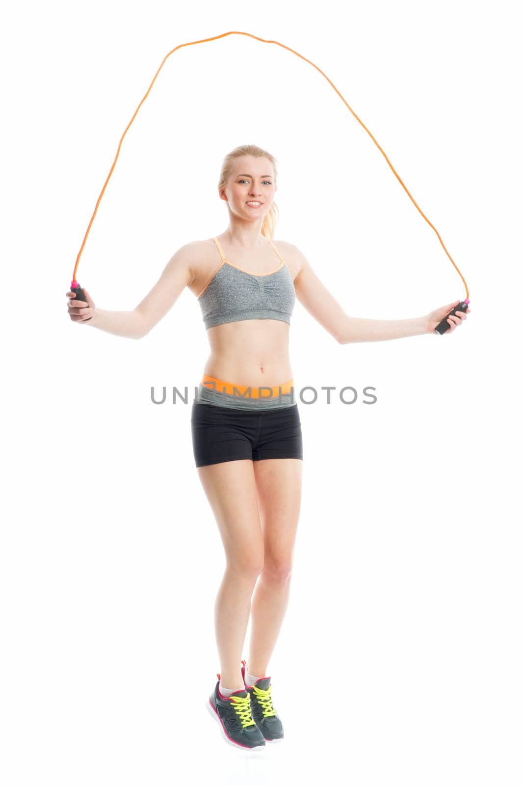 Blonde girl with skipping rope