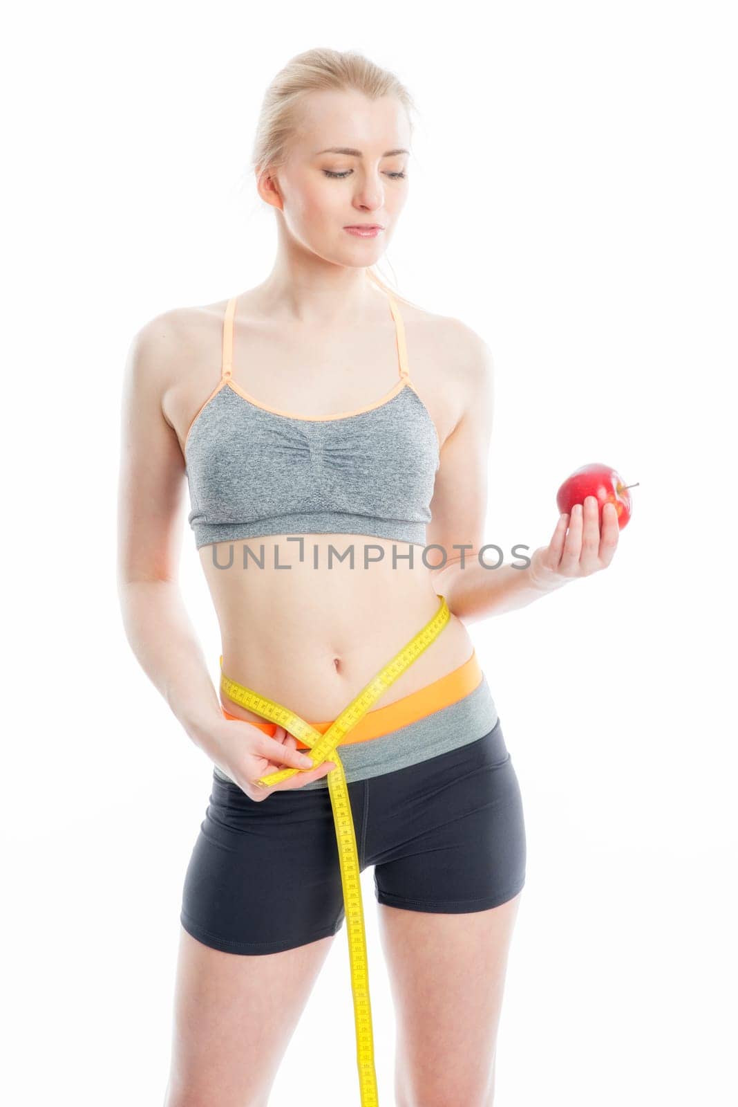 Blonde athlete with tape measure