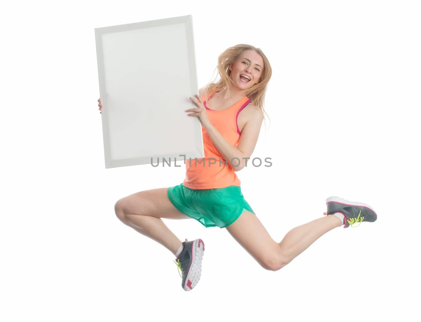 Blonde athlete with advertising sign