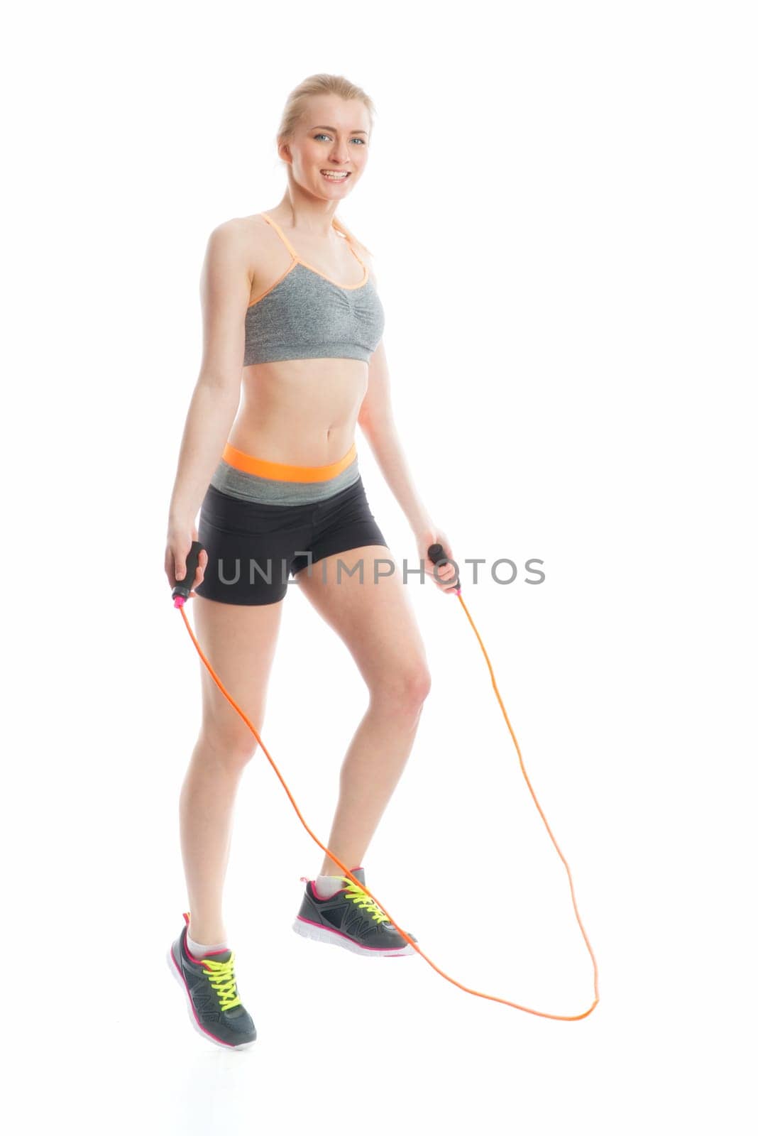 Blonde girl with skipping rope