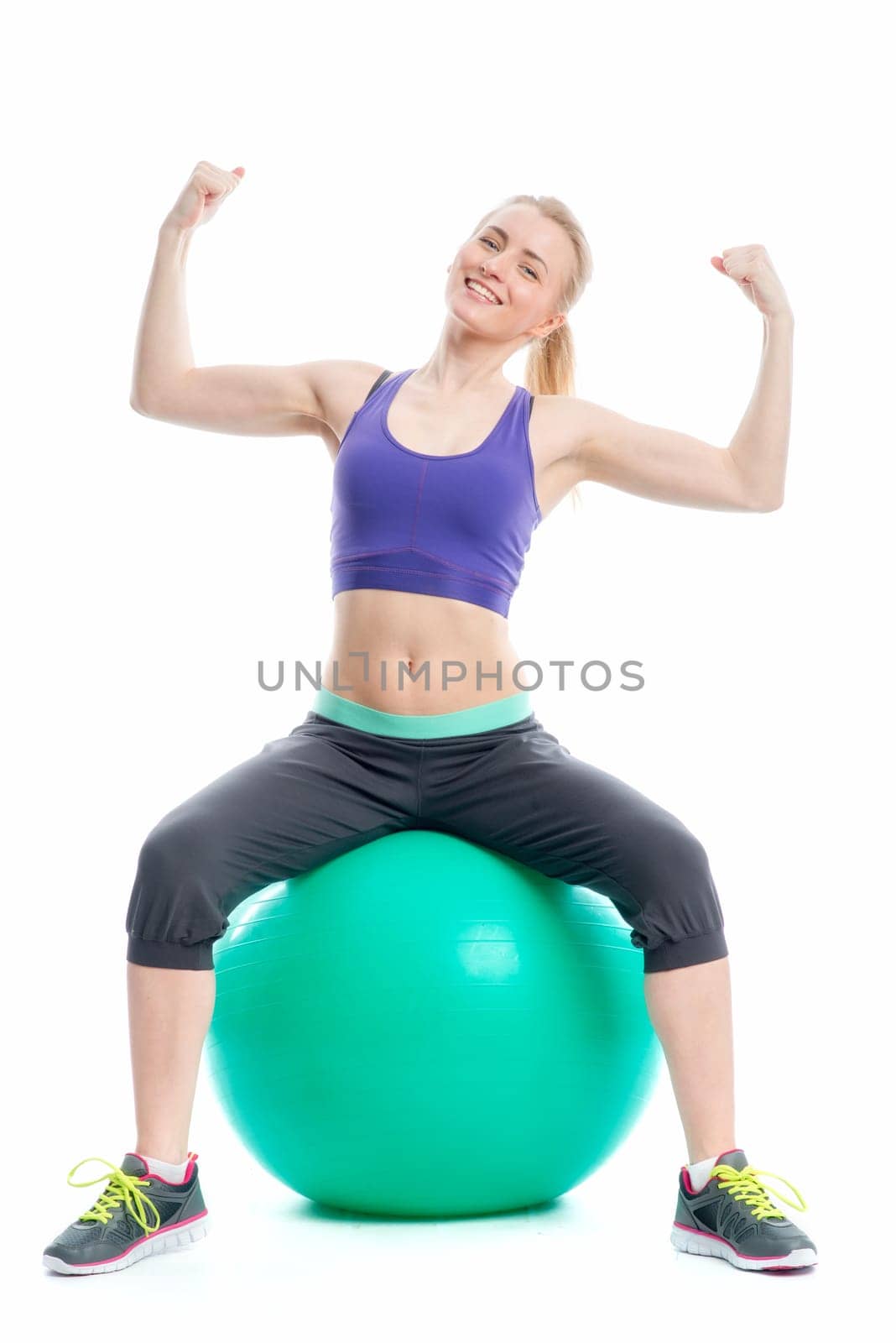 Blonde athlete on a pezziball