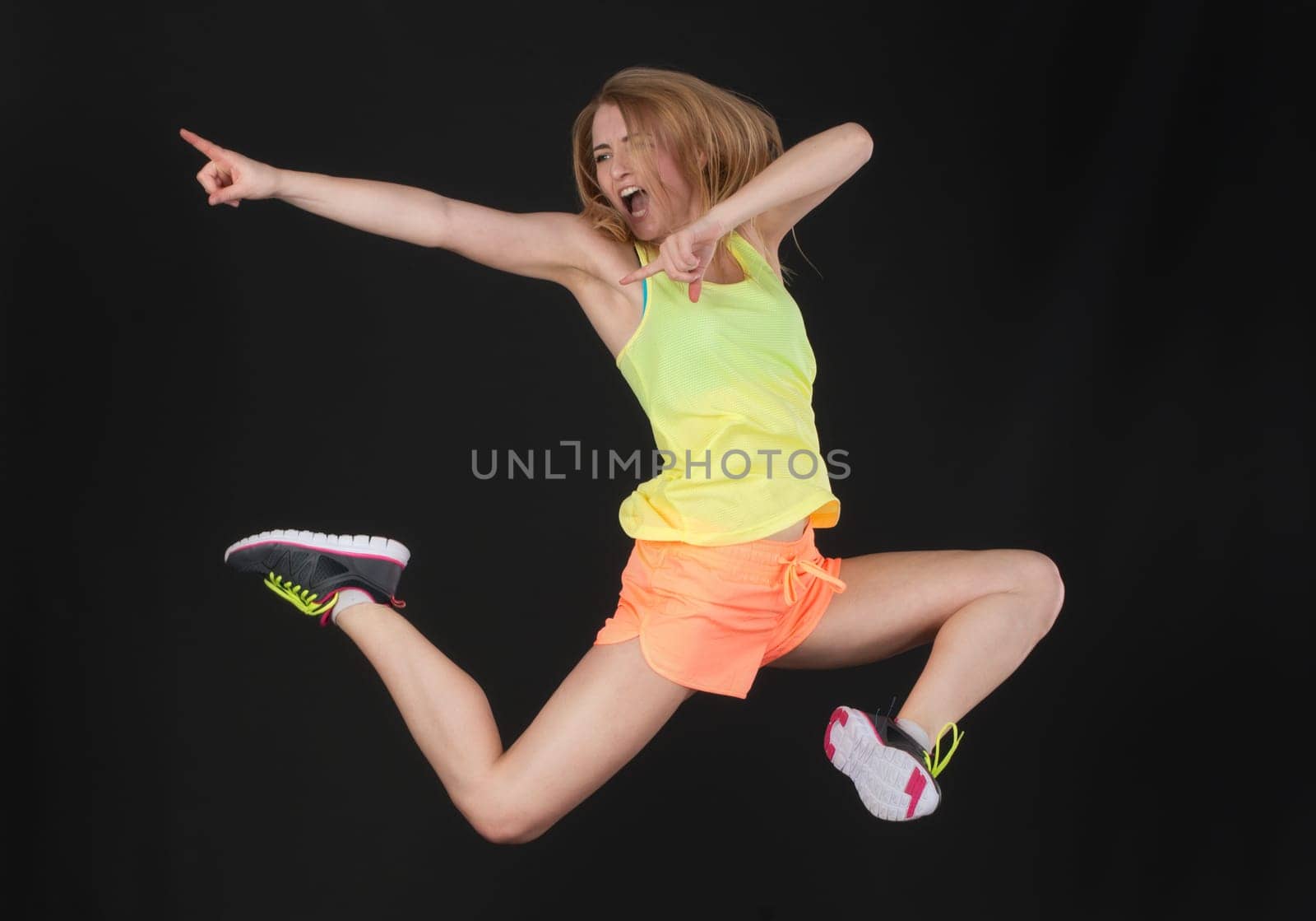 Blonde athlete takes a leap of joy
