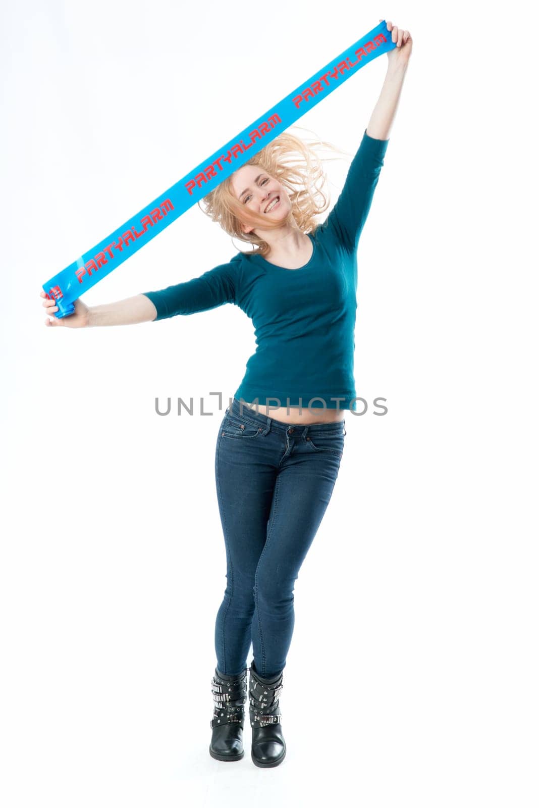 Blonde girl holds up an advertising banner with inscription