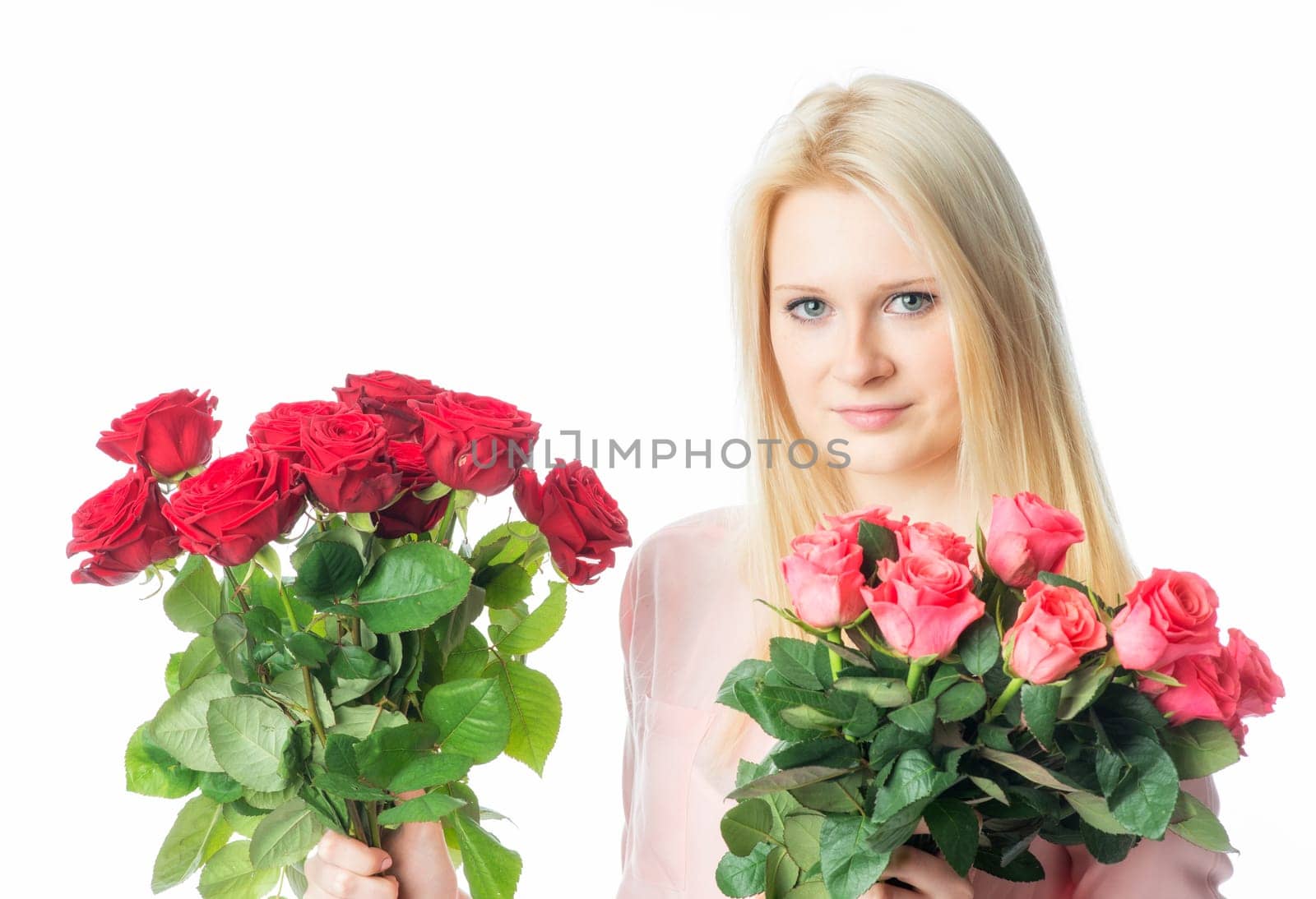 Blonde girl with bouquet of roses