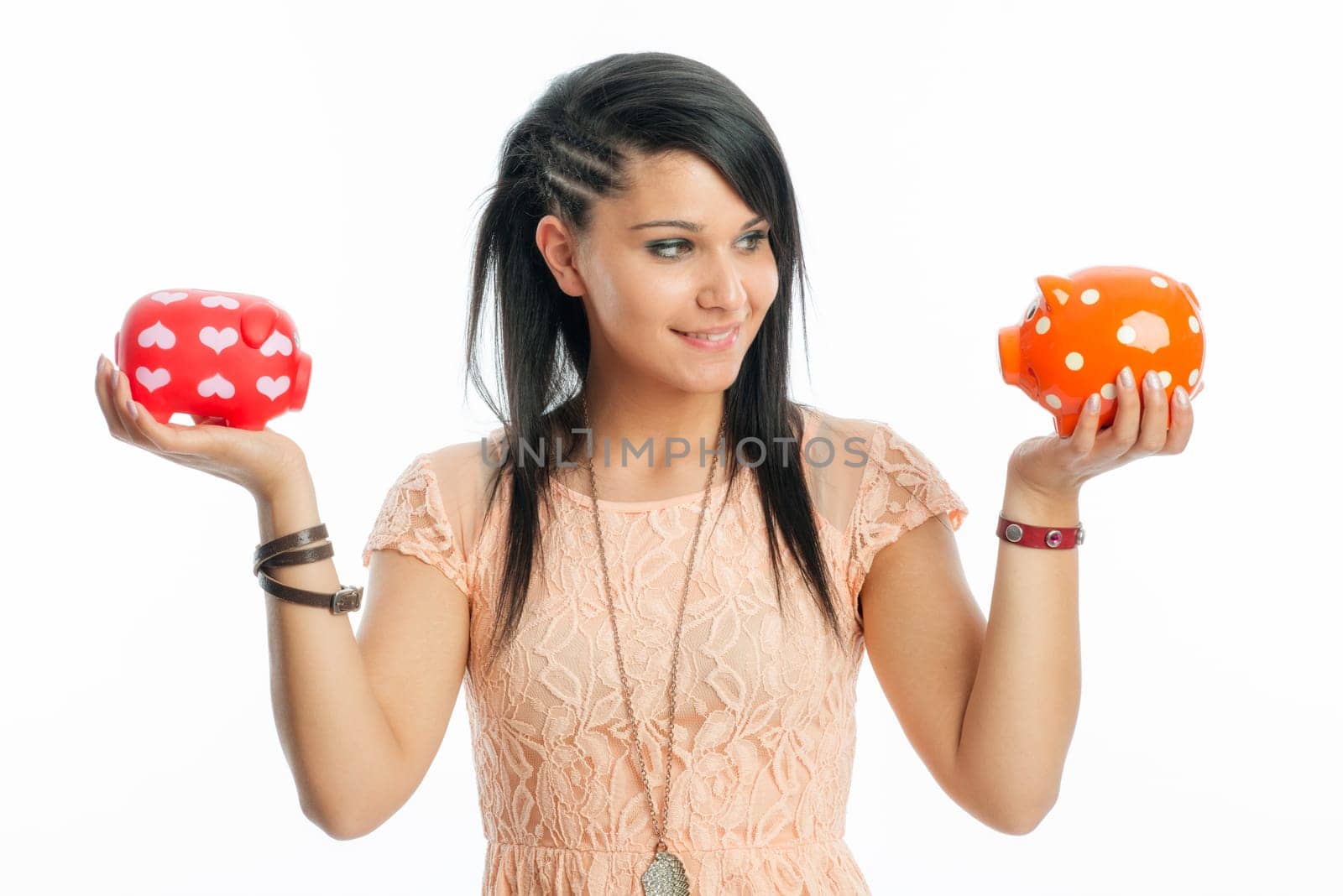 Young girl with piggy banks