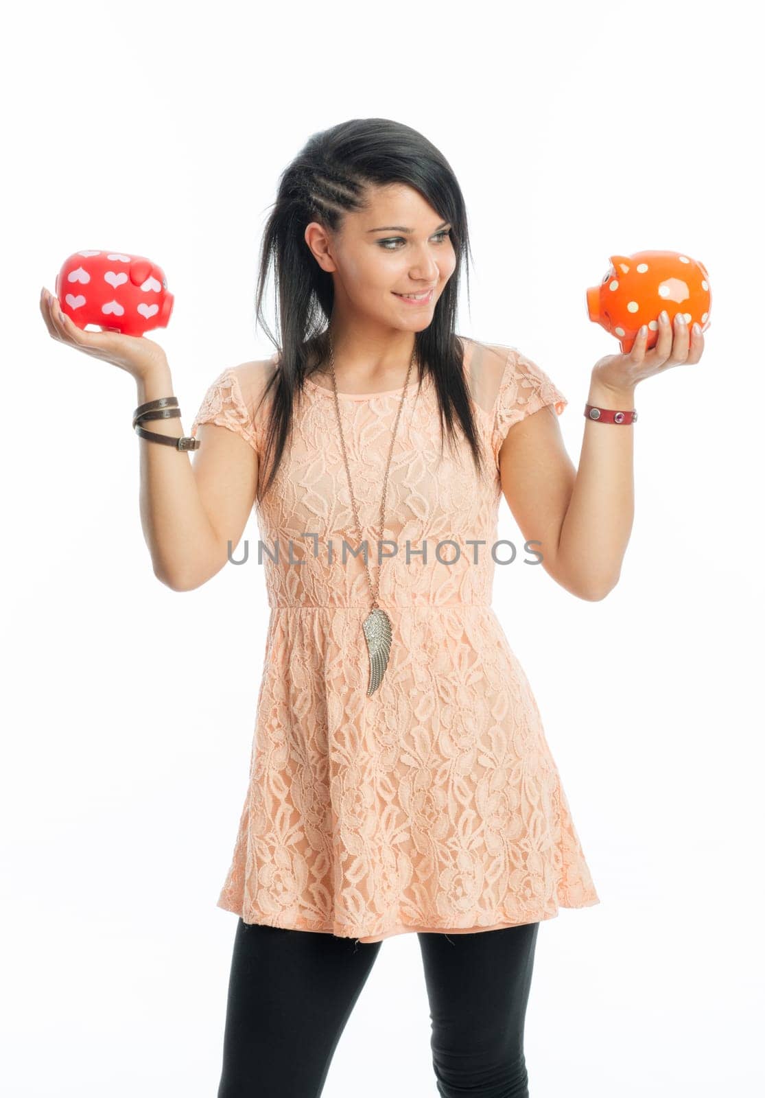 Young girl with piggy banks