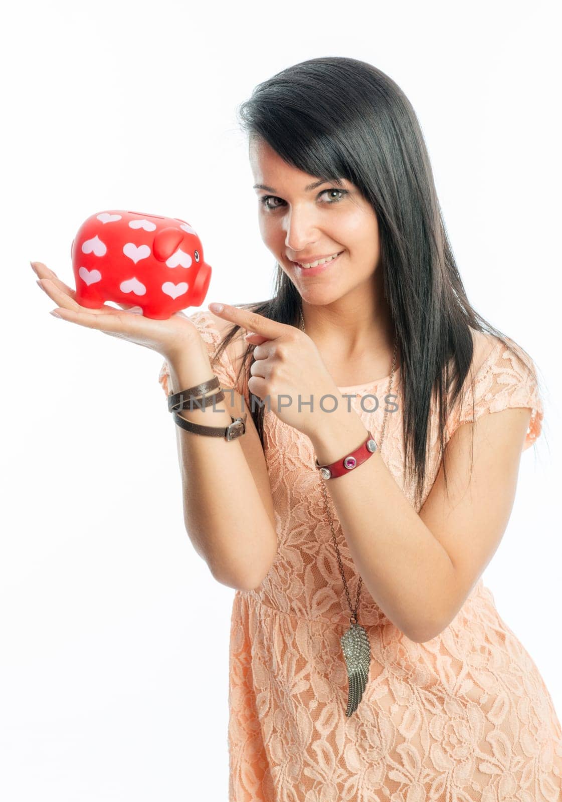 Young girl with piggy banks