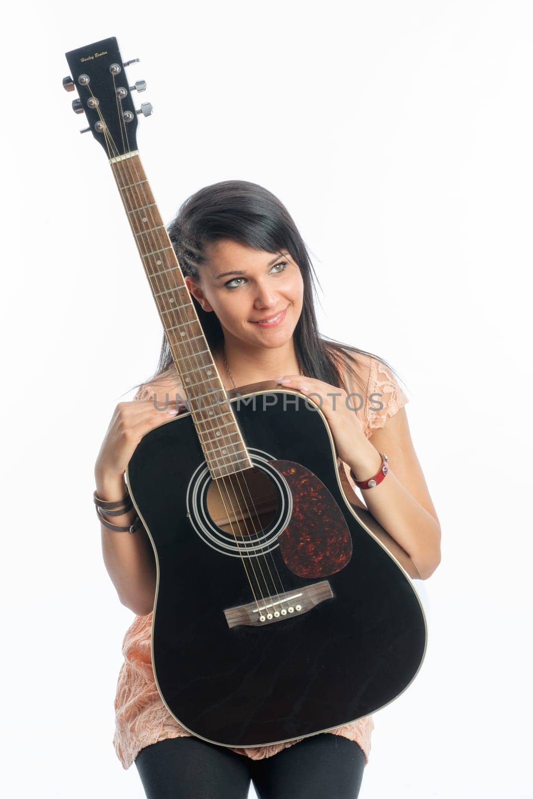 Black-haired girl with guitar