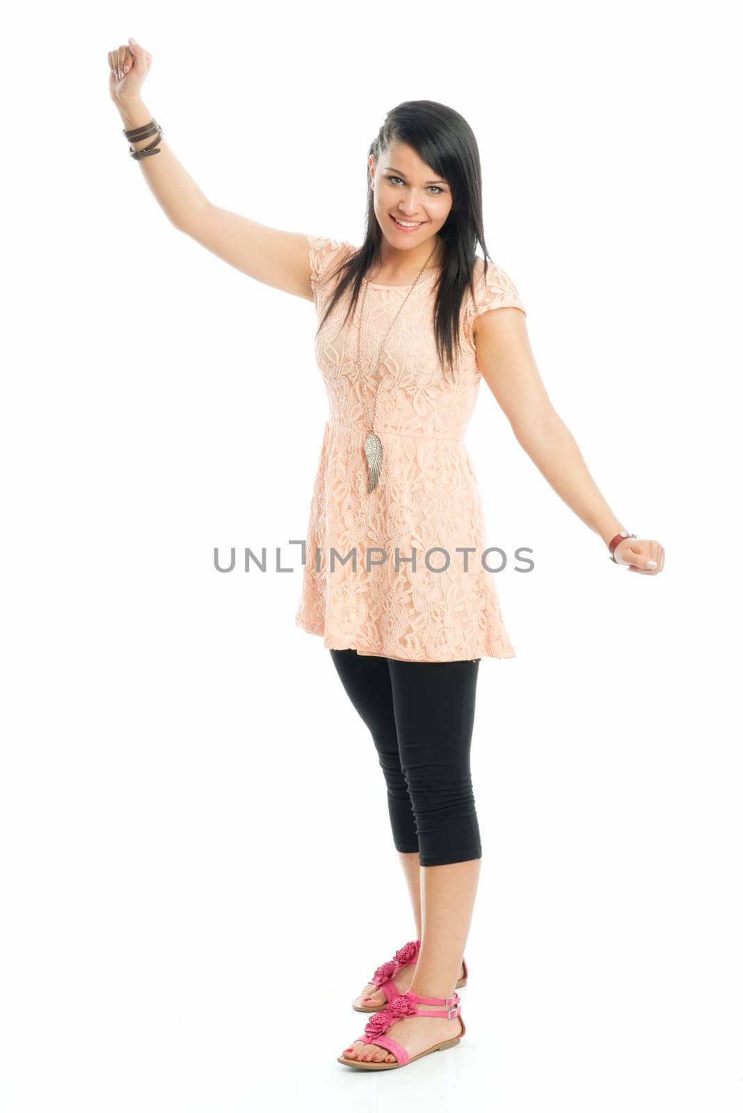 Black-haired girl points up