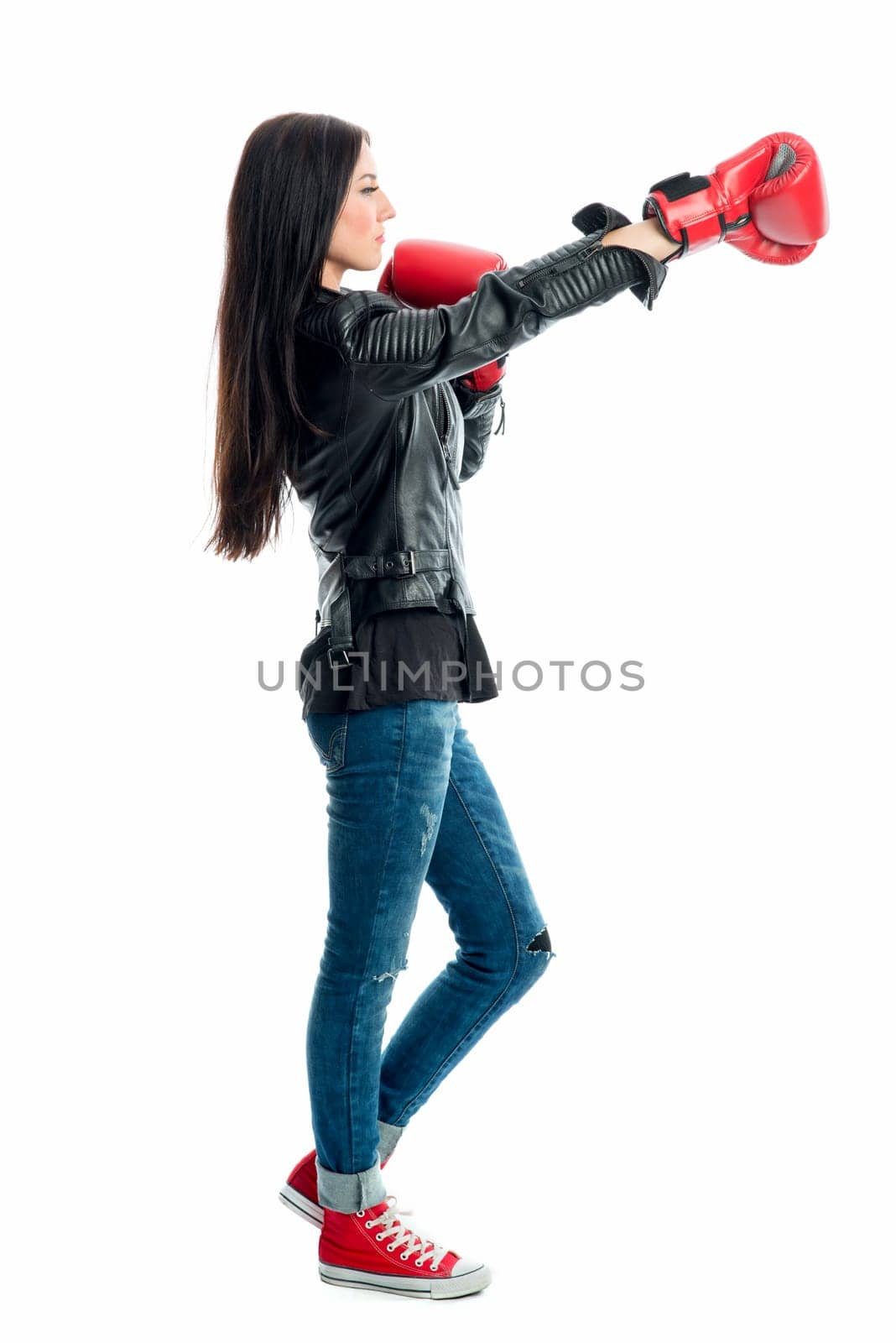 Young woman with boxing gloves